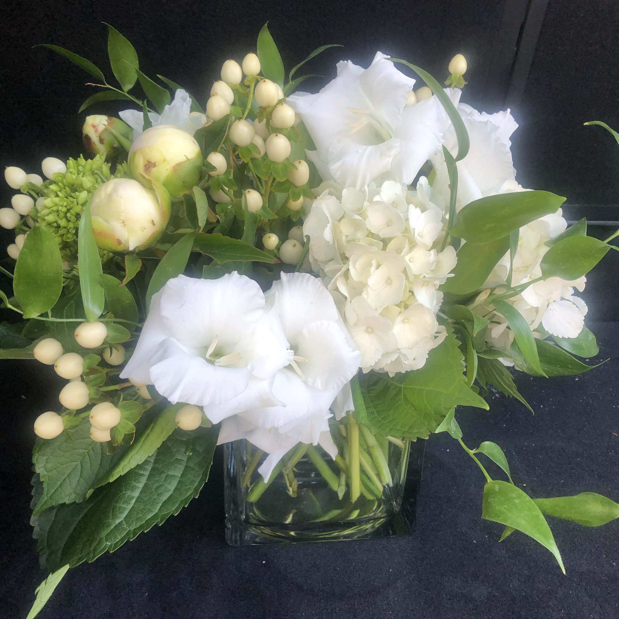 Christmas and Holiday Bouquets, Centerpieces, Wreaths and Garland. Prices vary.