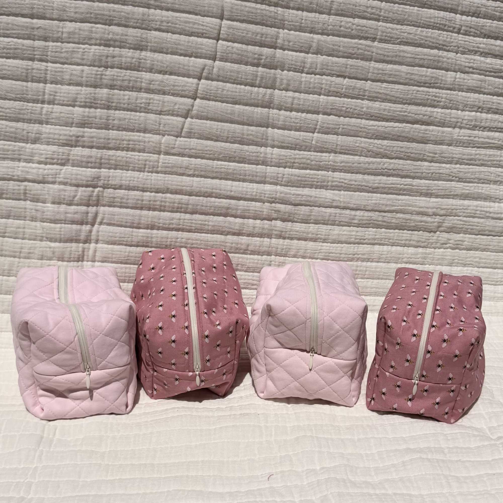 A cheerful set of quilted zip pouches designed for everyday organizing and, photo 2 of 2