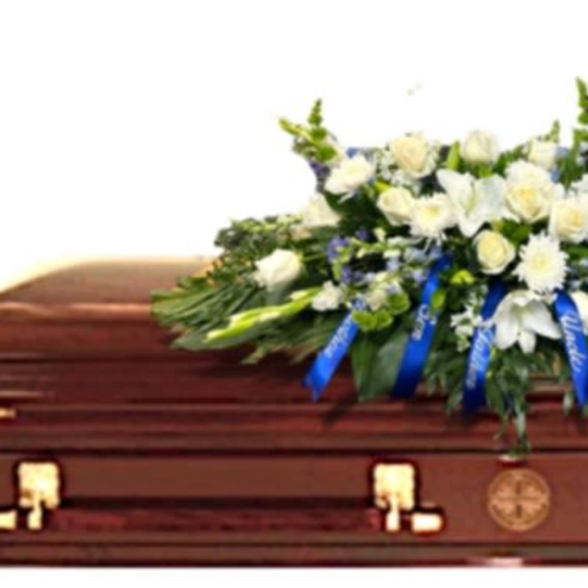 Blue and White Casket Tribute offers a serene and heartfelt tribute, featuring
