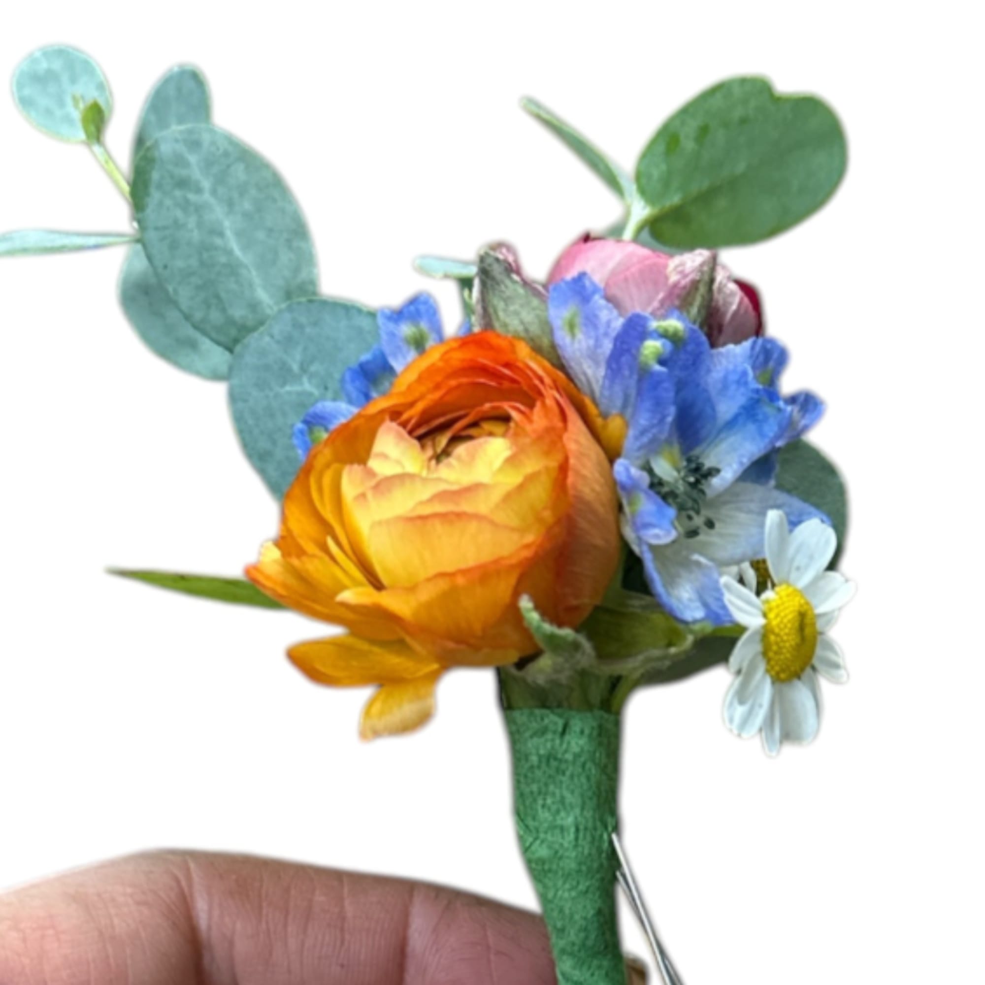 Small boutonniere with orange, blue, and white flowers
