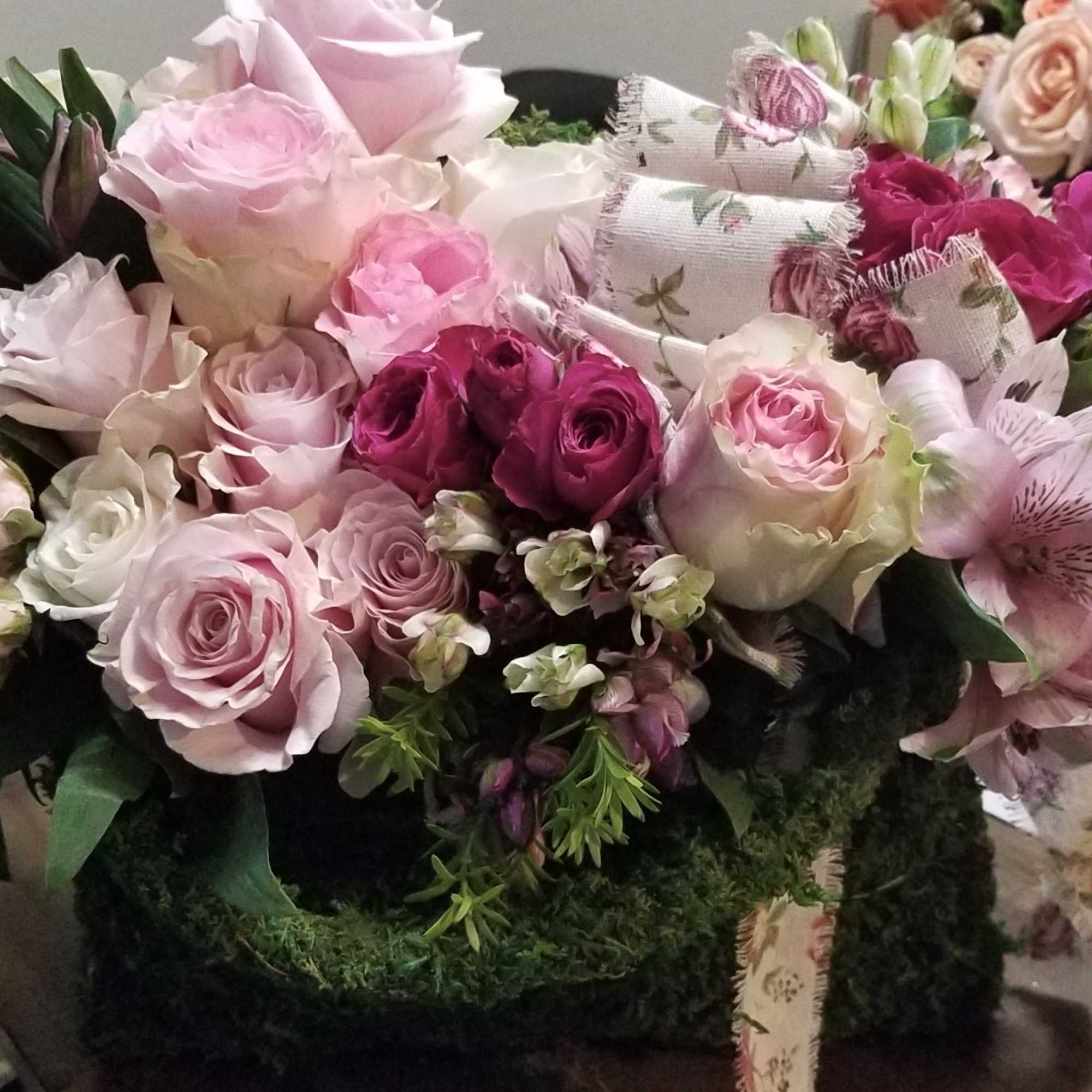 Pink and white rose bouquet with alstroemeria and ribbon