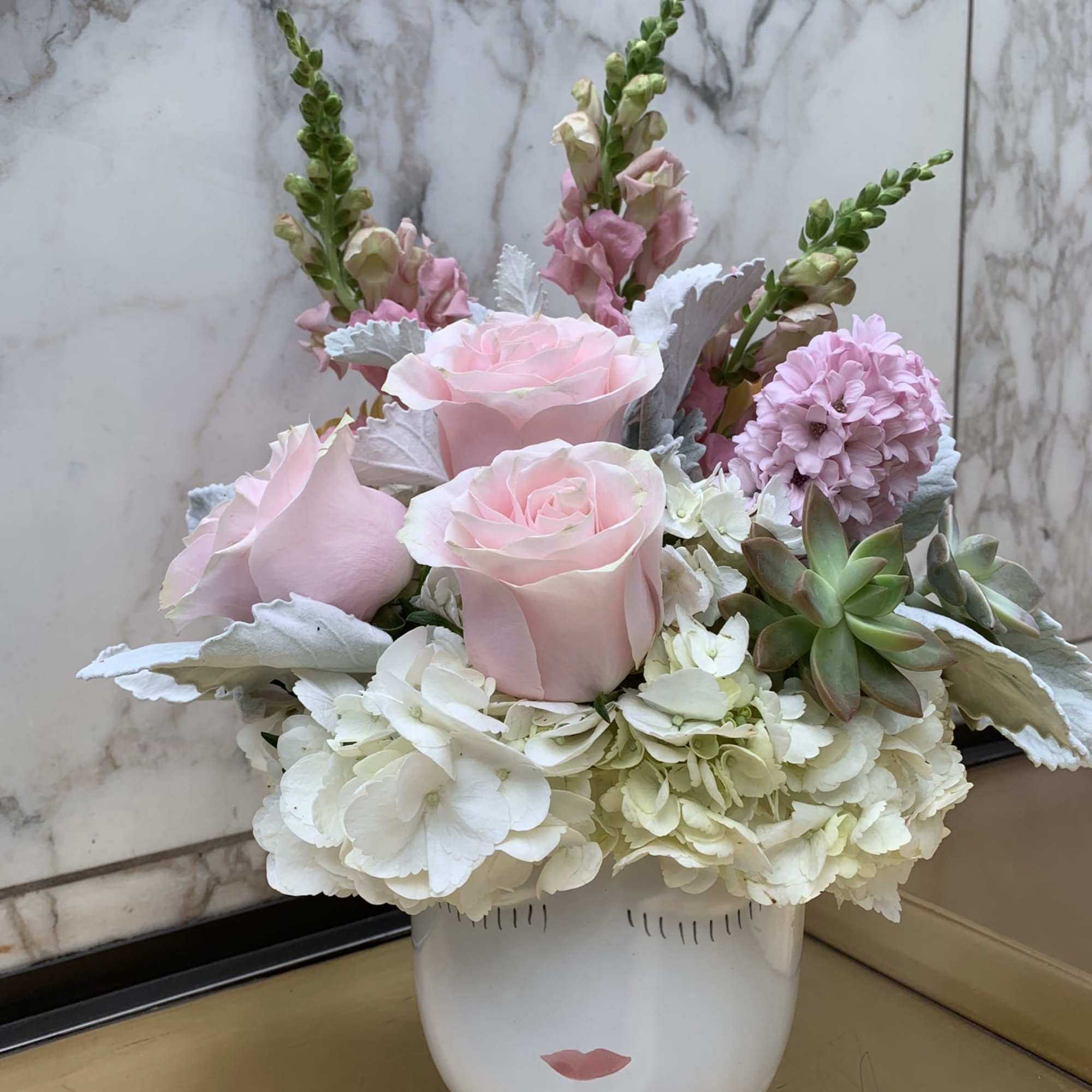 Pink roses and white hydrangeas in a white face vase, photo 4 of 7