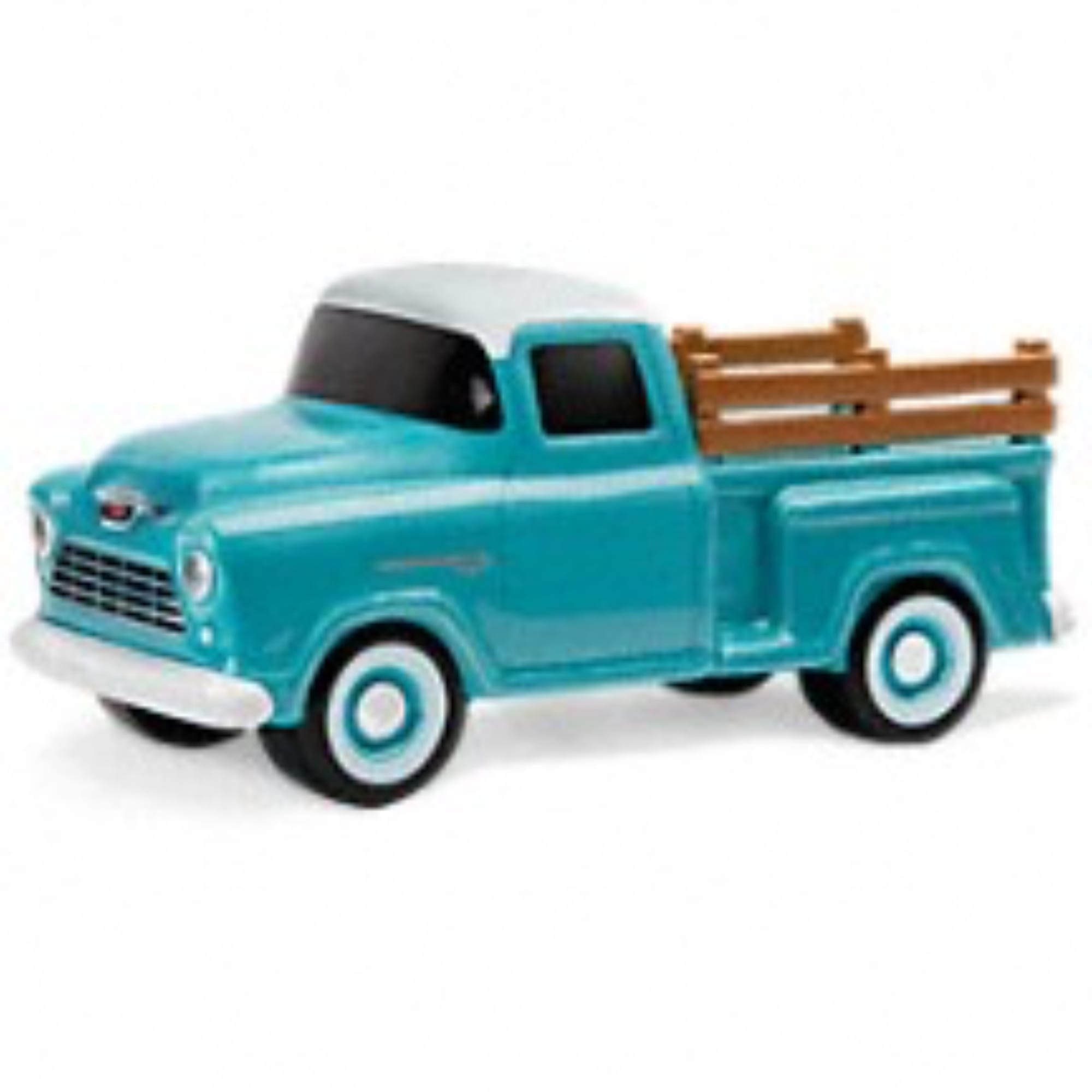 Turquoise toy pickup truck with a wooden bed on a white background