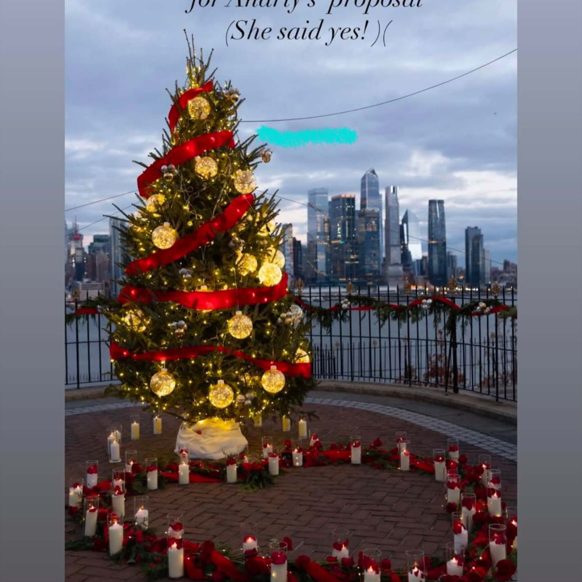 Decorated Christmas tree with red ribbon and gold ornaments