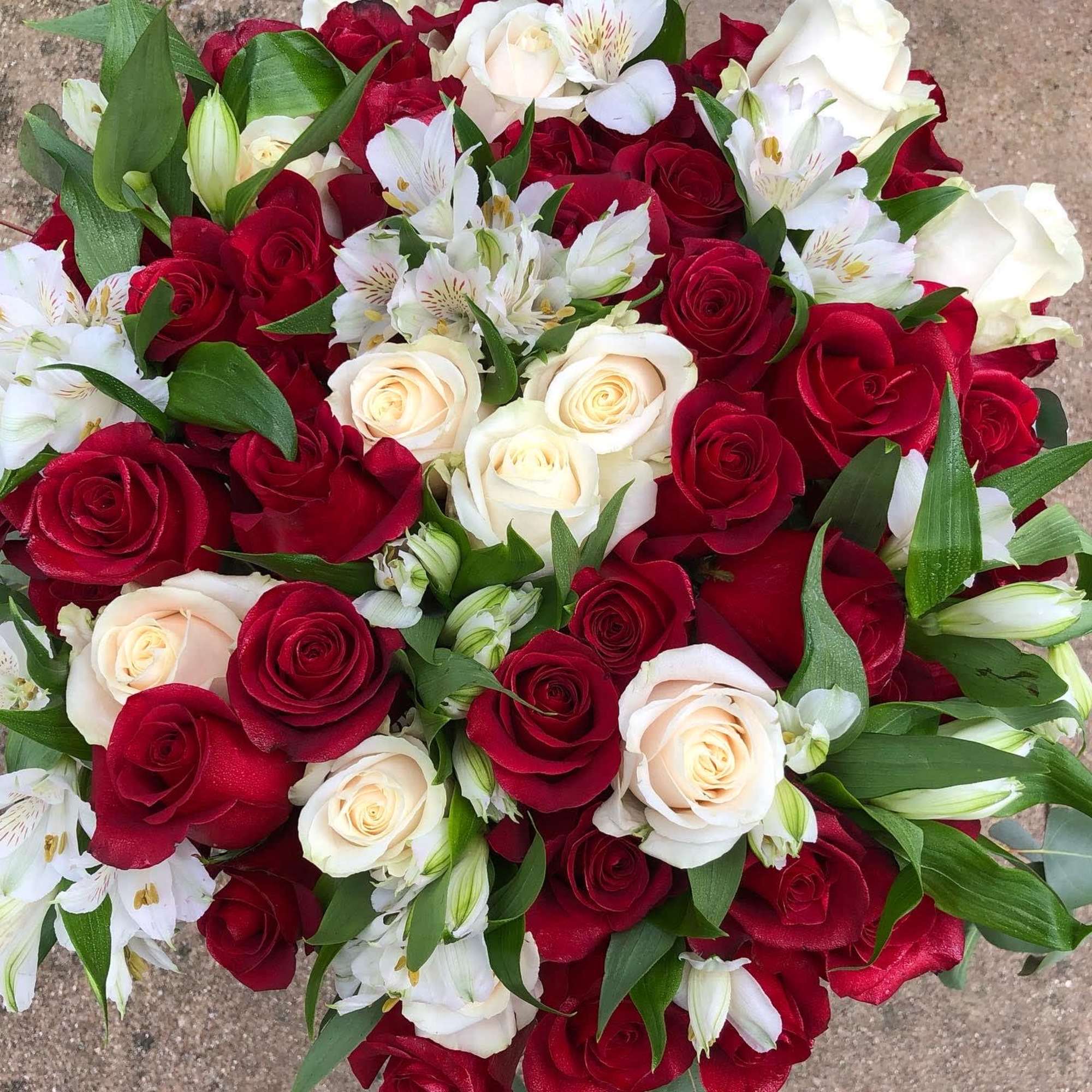 Bouquet of red and white roses with white alstroemeria