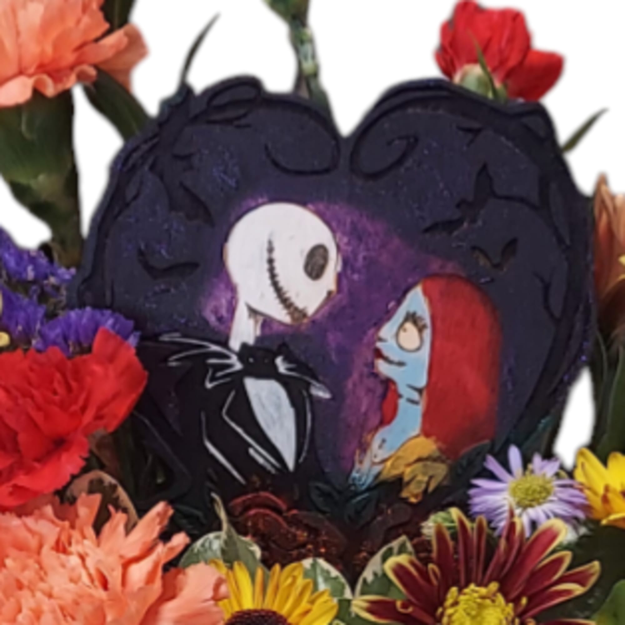 Floral arrangement with a Jack Skellington and Sally centerpiece