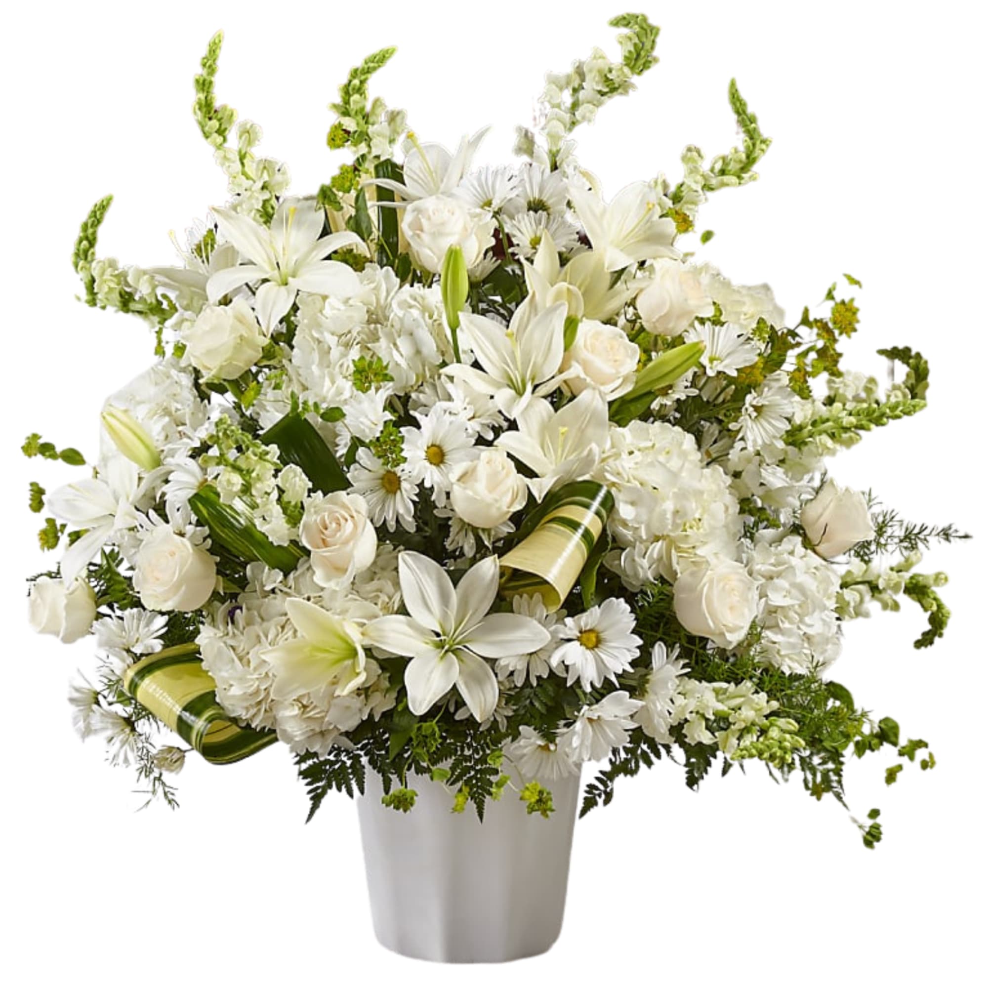 White floral arrangement in a white vase with lilies and roses