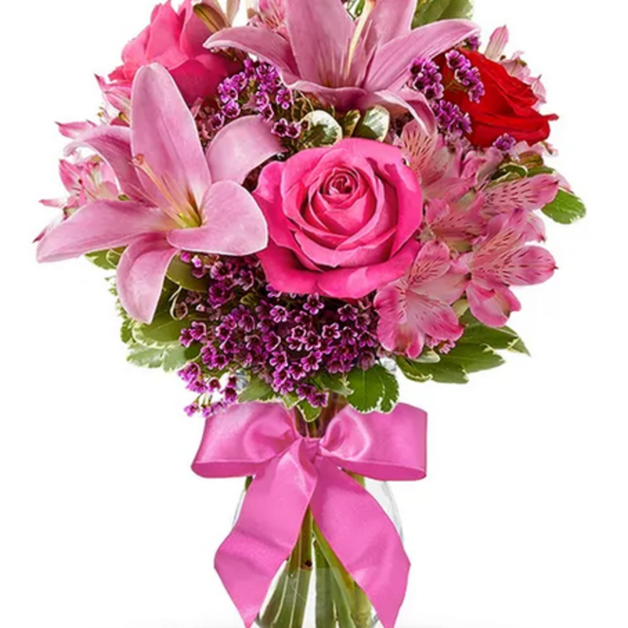This flirtatious combination of Asiatic lilies, waxflower, alstroemeria and roses makes a