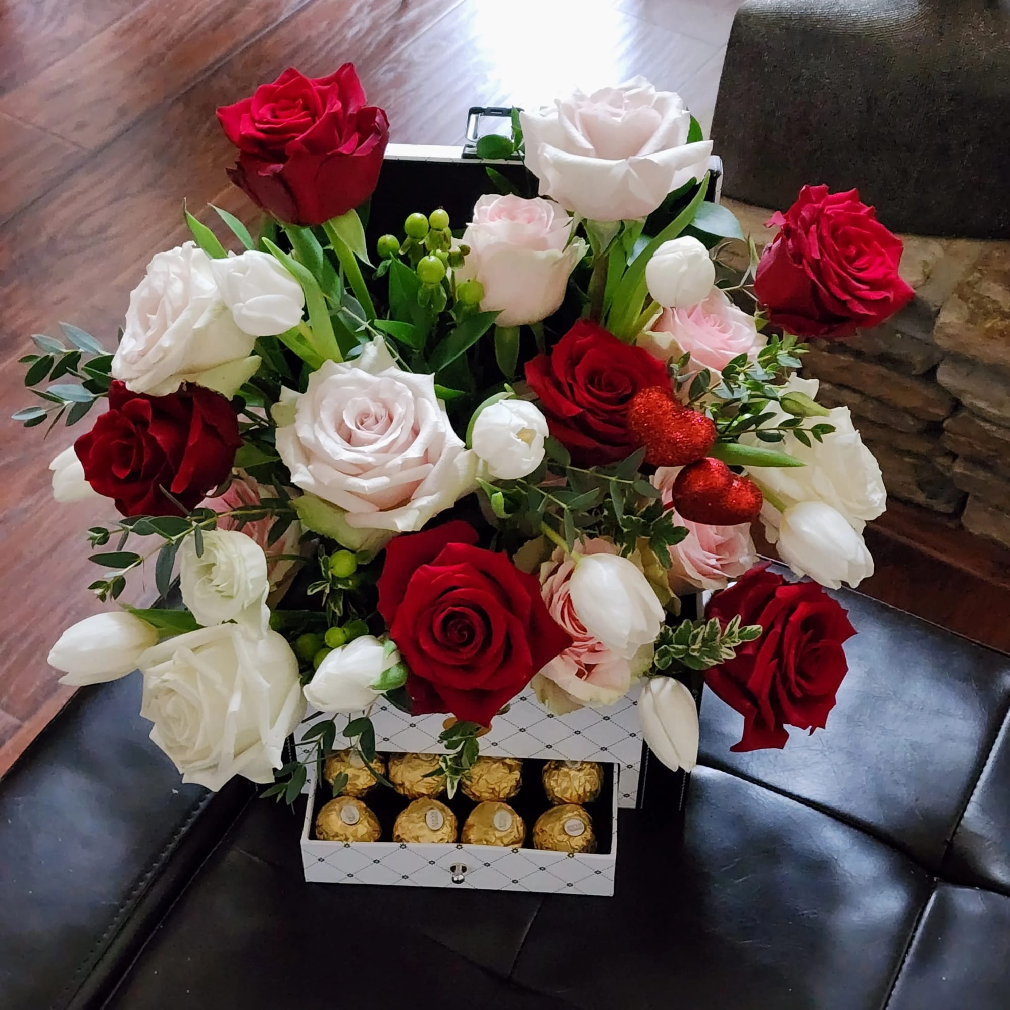 Box arrangement of red and white roses with Ferrero Rocher chocolates