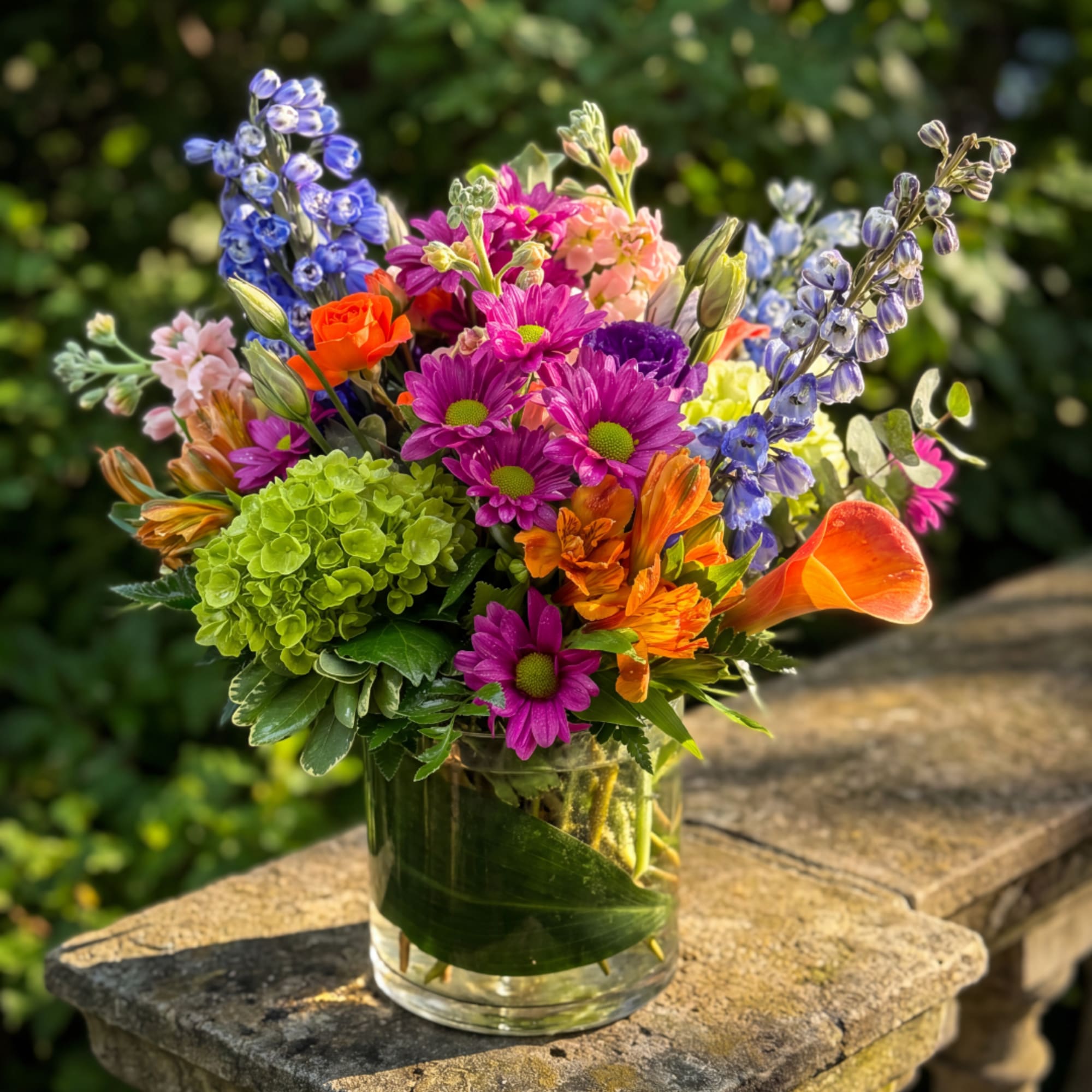 Colorful mixed bouquet in a clear glass vase