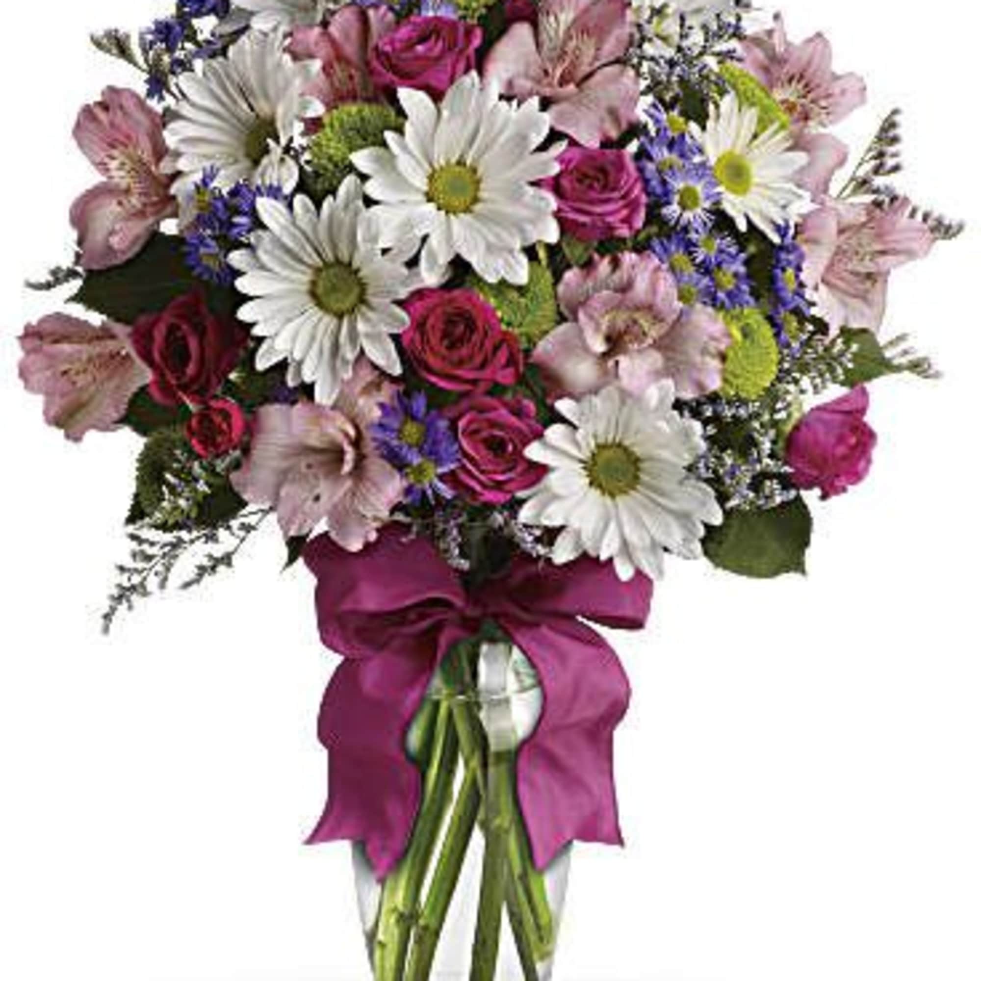 Bouquet of pink roses, white daisies, and pink alstroemeria in a glass vase