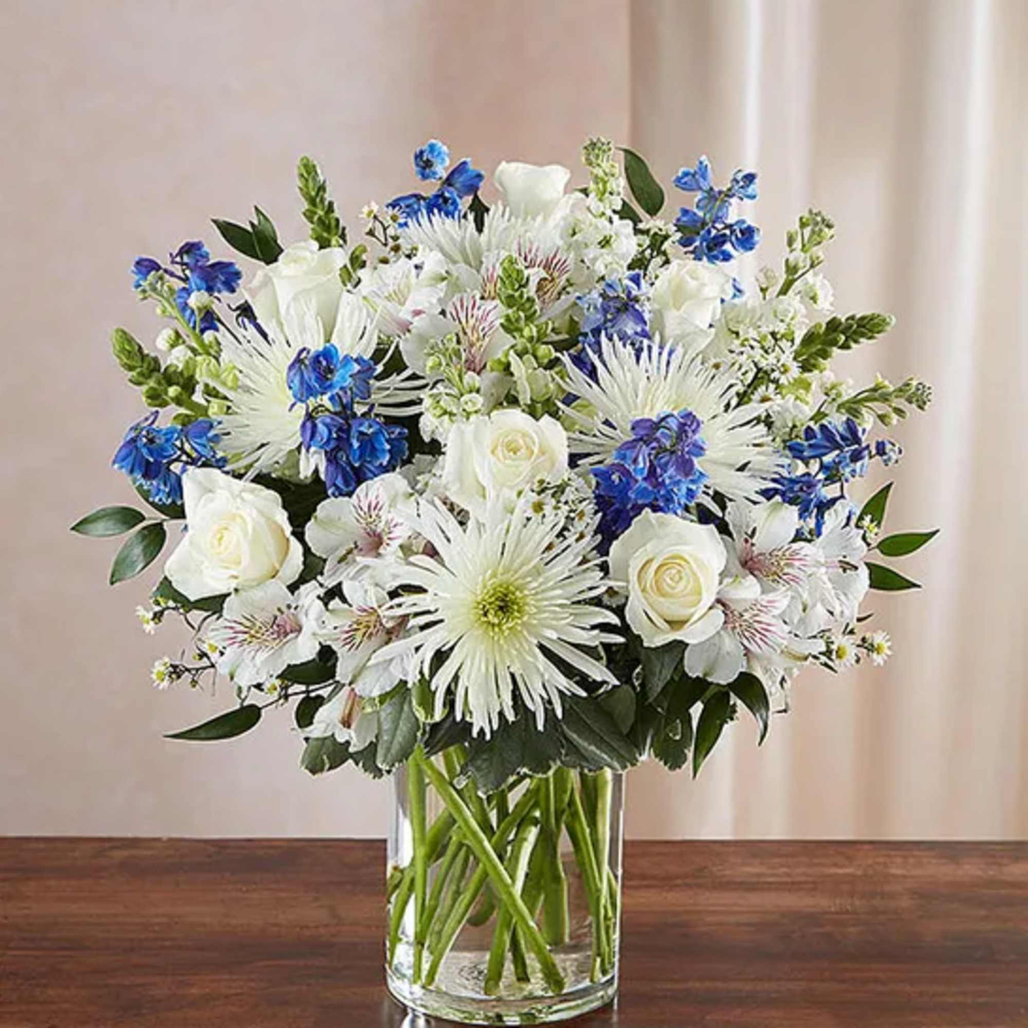 Product ID: 95410


Beautiful in blue and white, our abundant sympathy arrangement makes