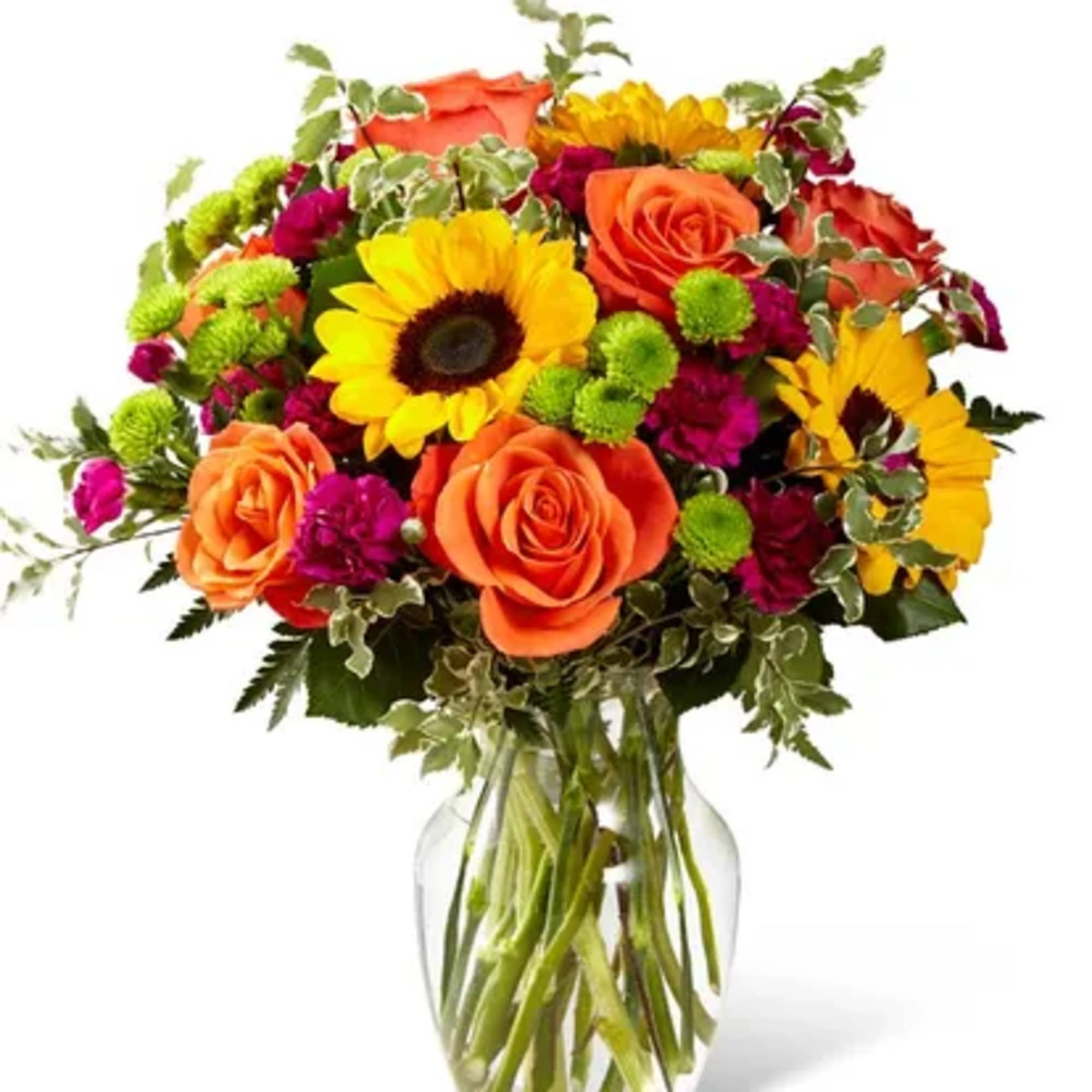 Bouquet of orange roses and yellow sunflowers in a glass vase