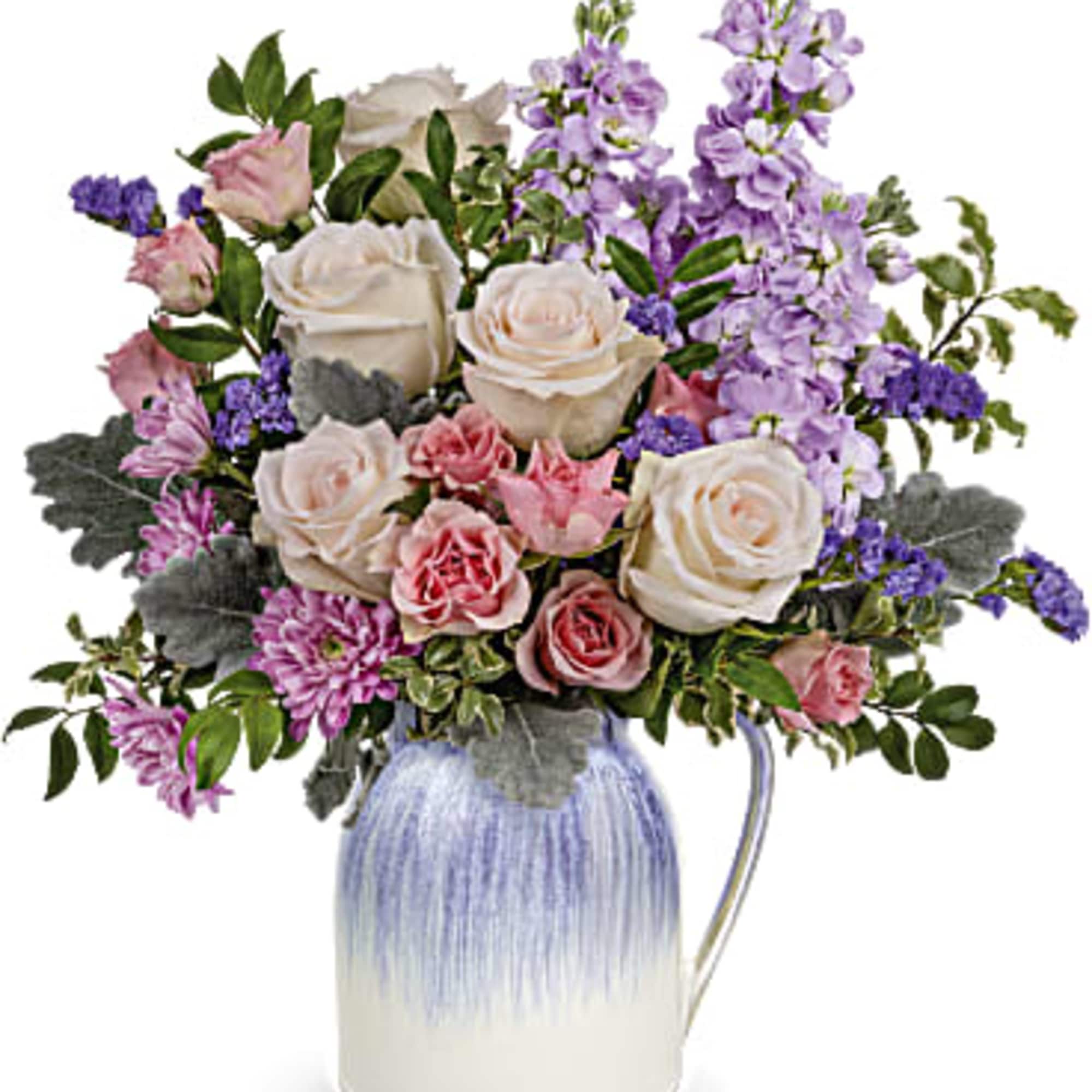 Bouquet of pink and white roses with purple flowers in a ceramic pitcher