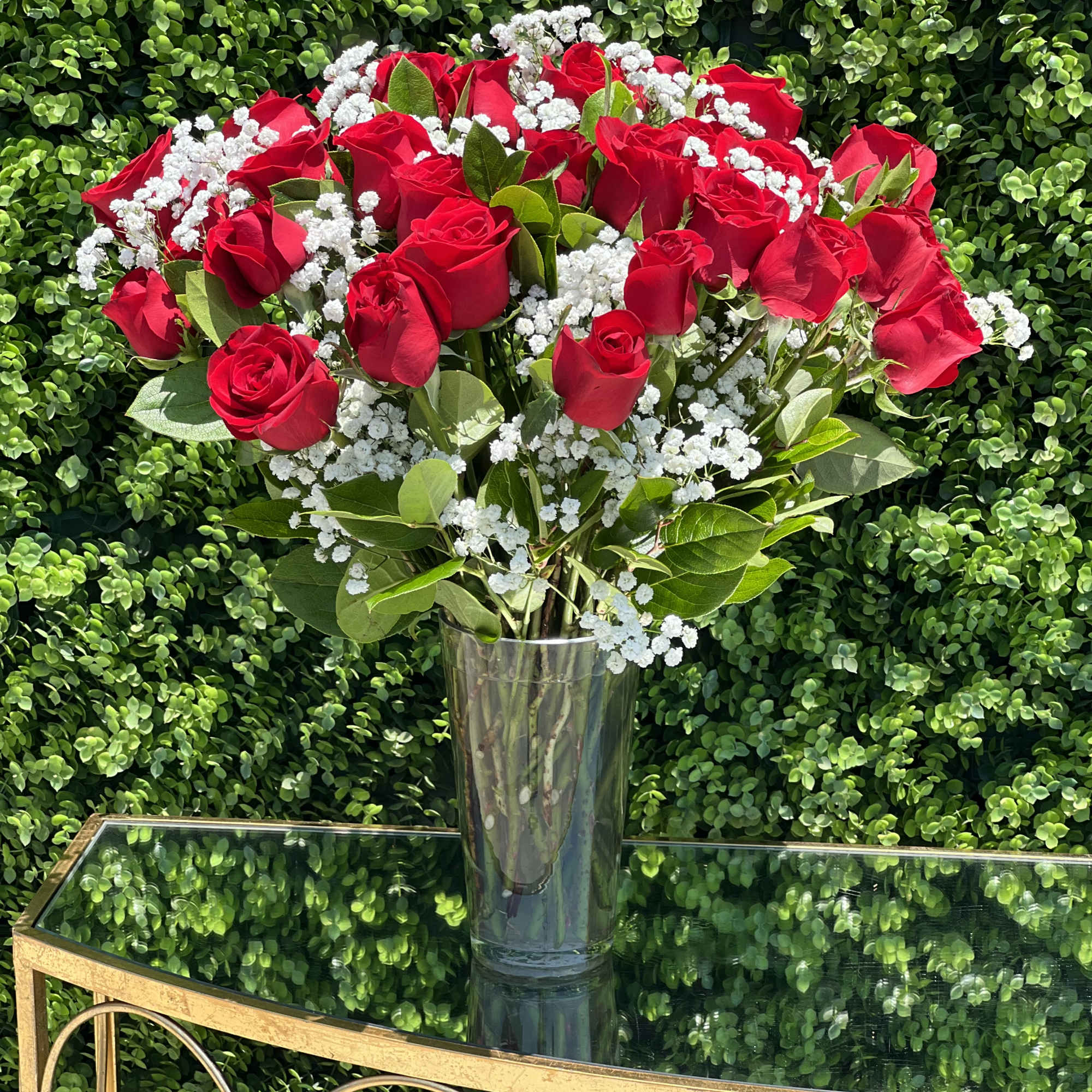 24 red roses in our cone vase with baby&rsquo;s breath , lush