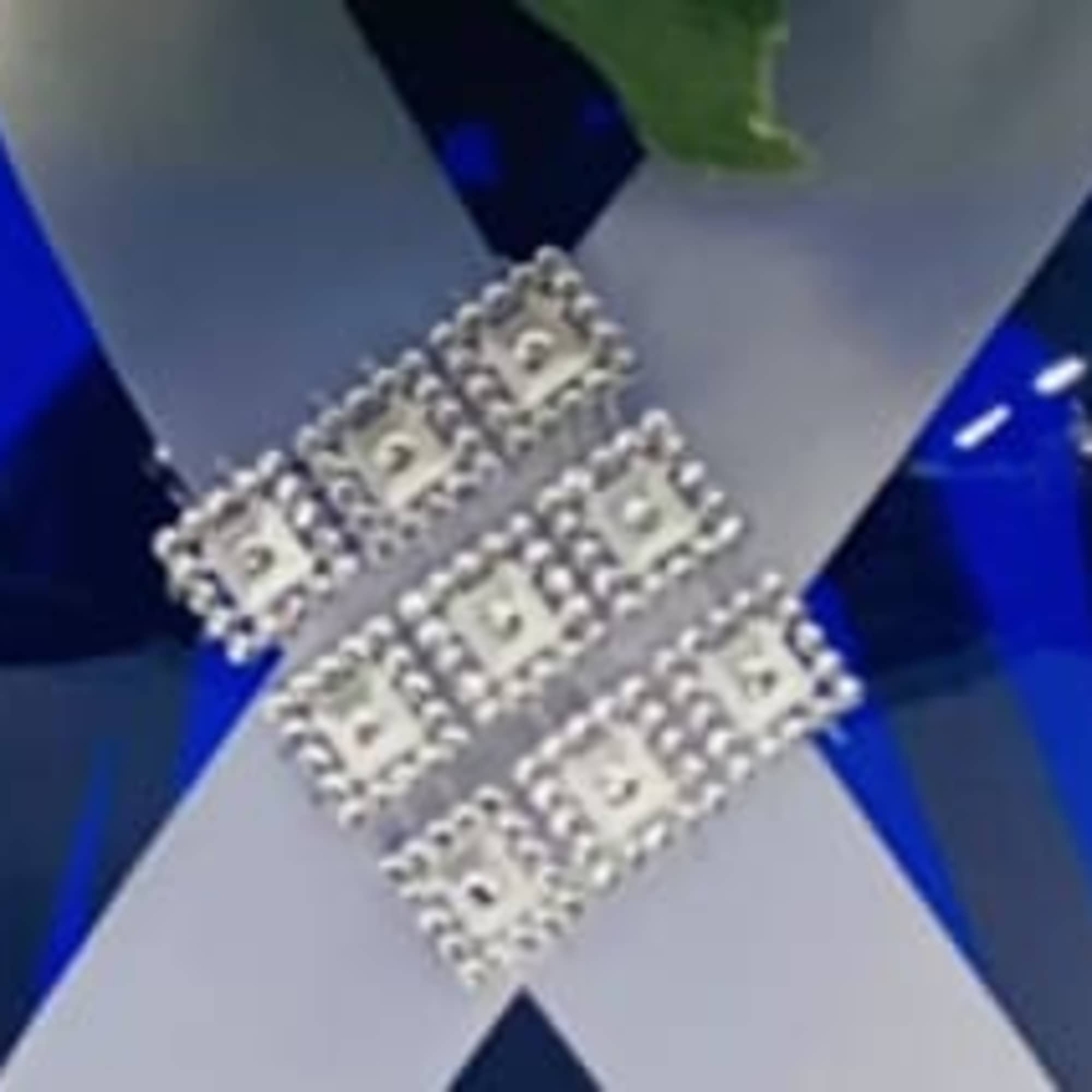 Blue and silver ribbon with a rhinestone buckle detail
