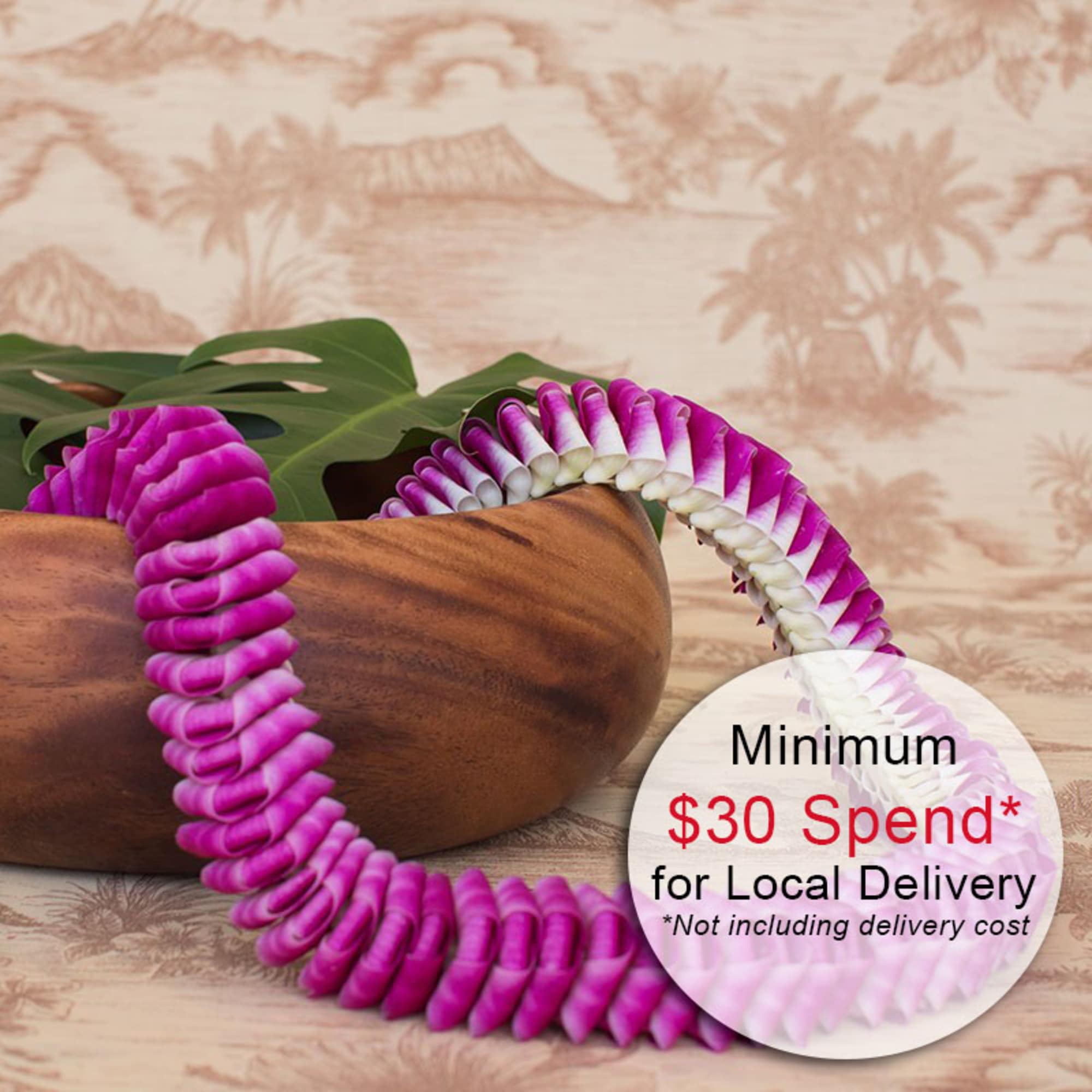 Purple and white orchid lei draped over a wooden bowl with a green leaf.