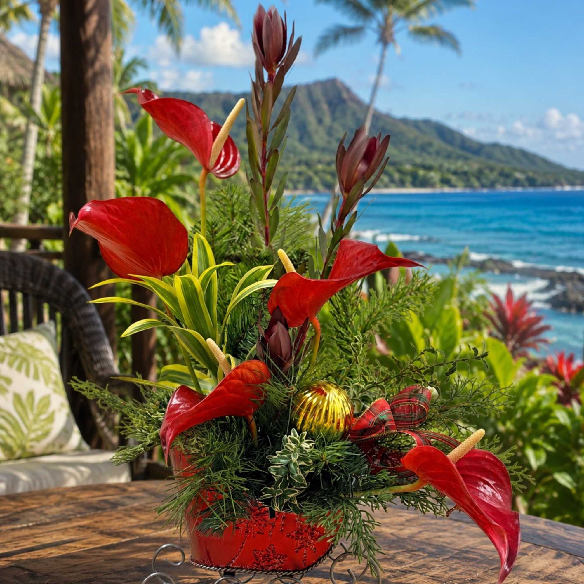 Tropical arrangement with red anthuriums in a red container