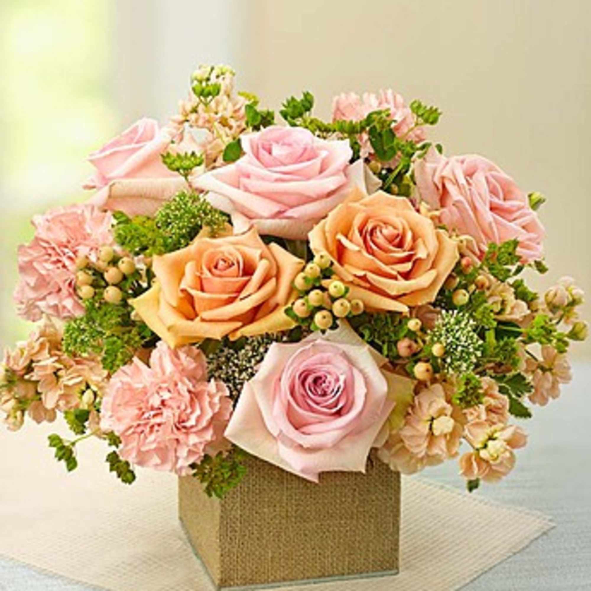 Pink and peach roses with carnations in a square box, photo 2 of 2
