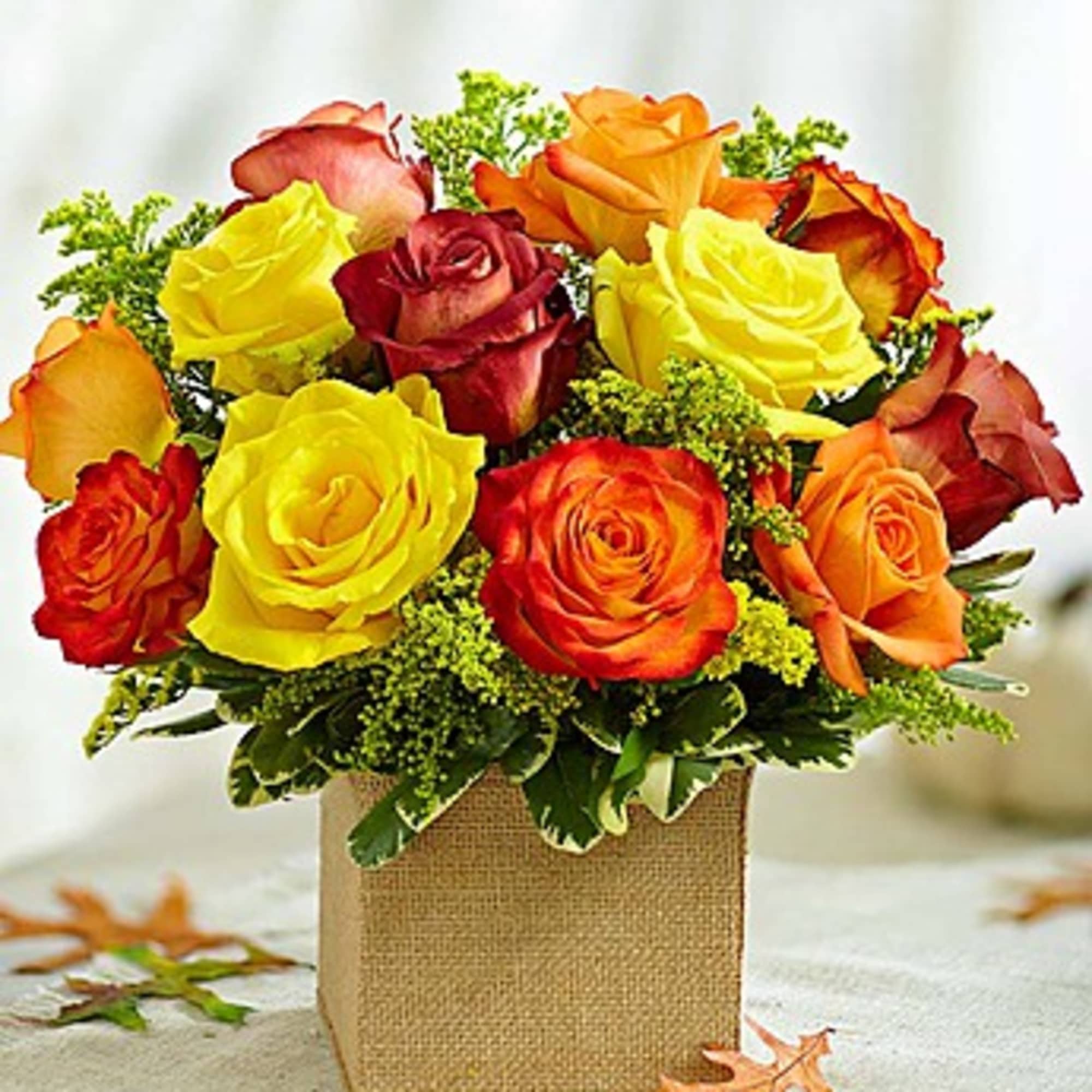 Bouquet of multicolored roses in a burlap-wrapped box, photo 2 of 2