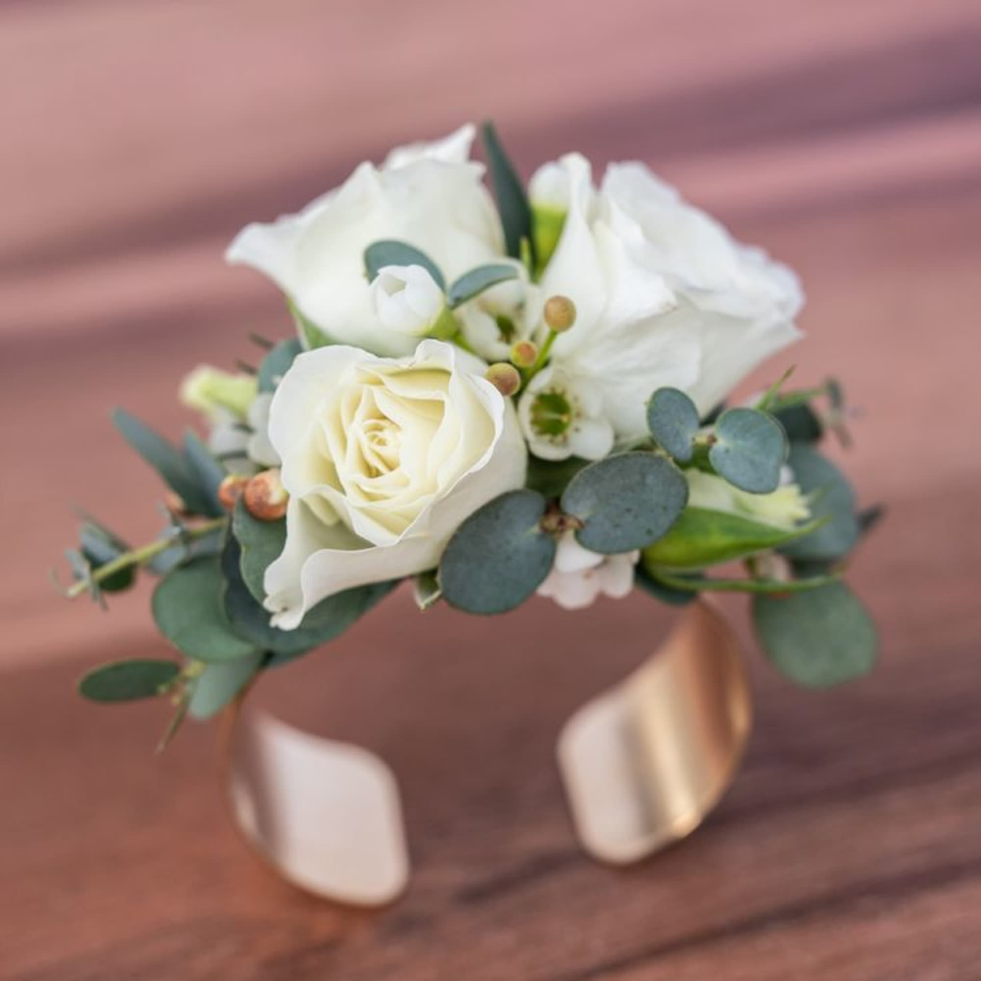 White rose boutonniere with eucalyptus and ribbon wrap