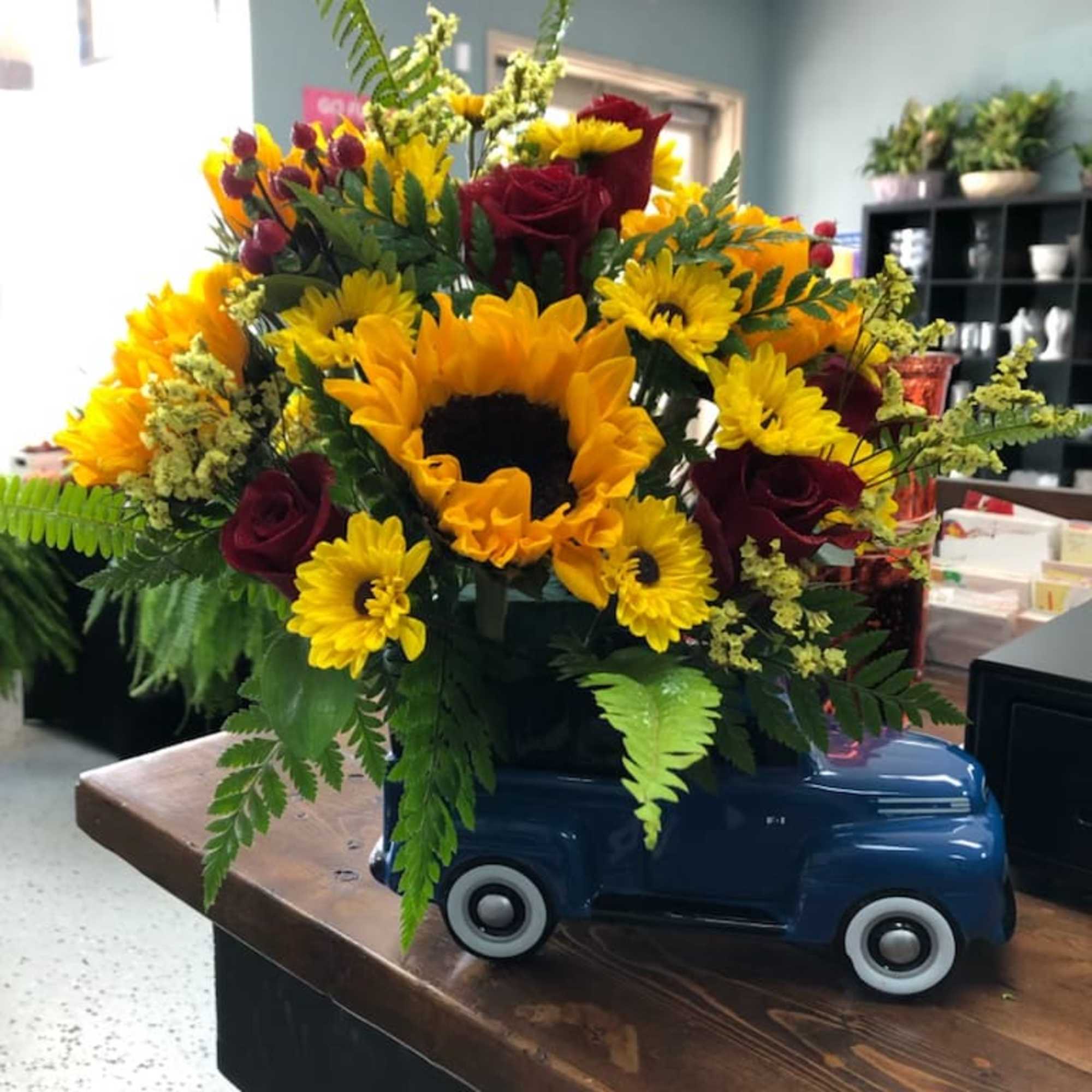 Ford truck with sunflowers and red roses, photo 2 of 2