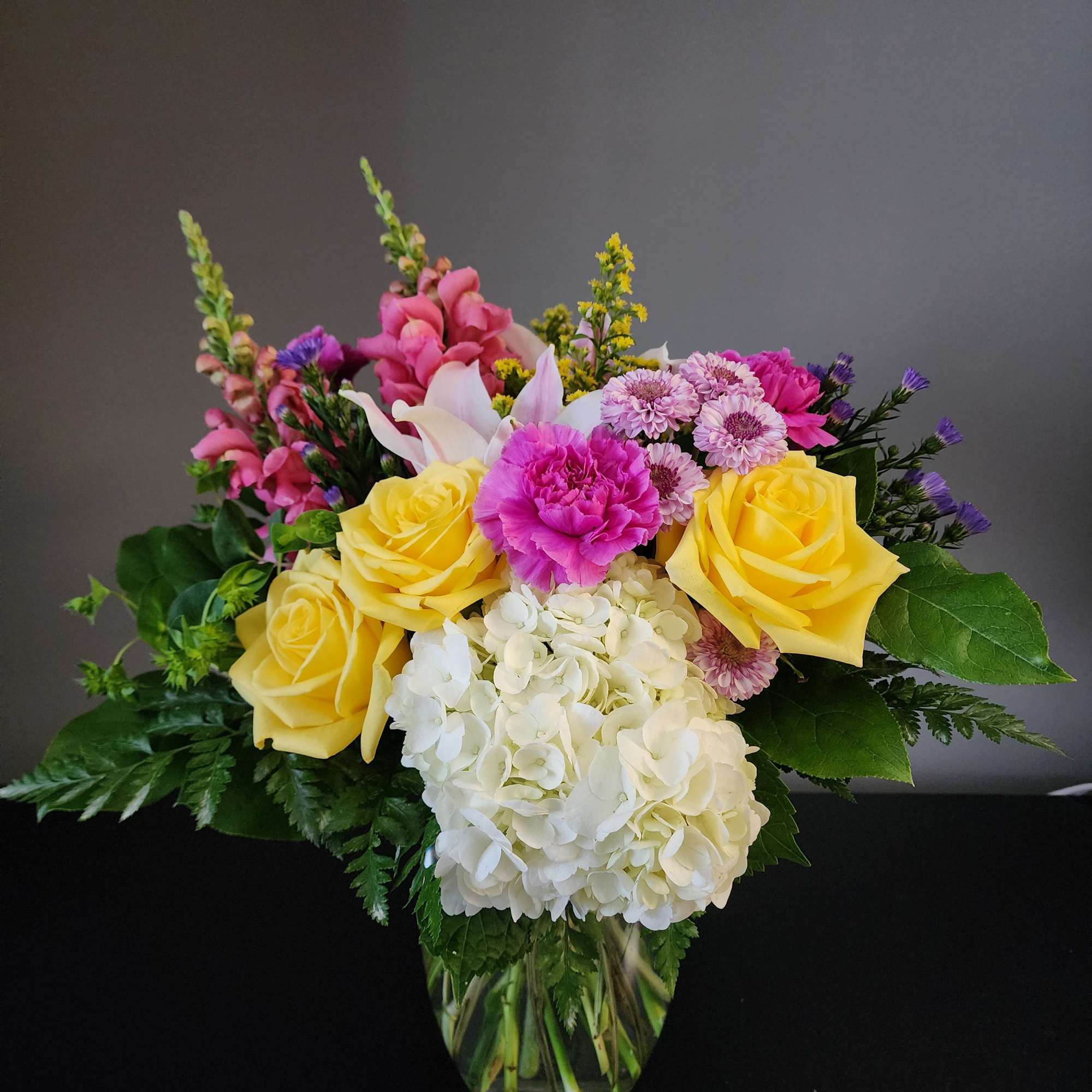 Bright blooms may vary in this design.   Blooms selected are
