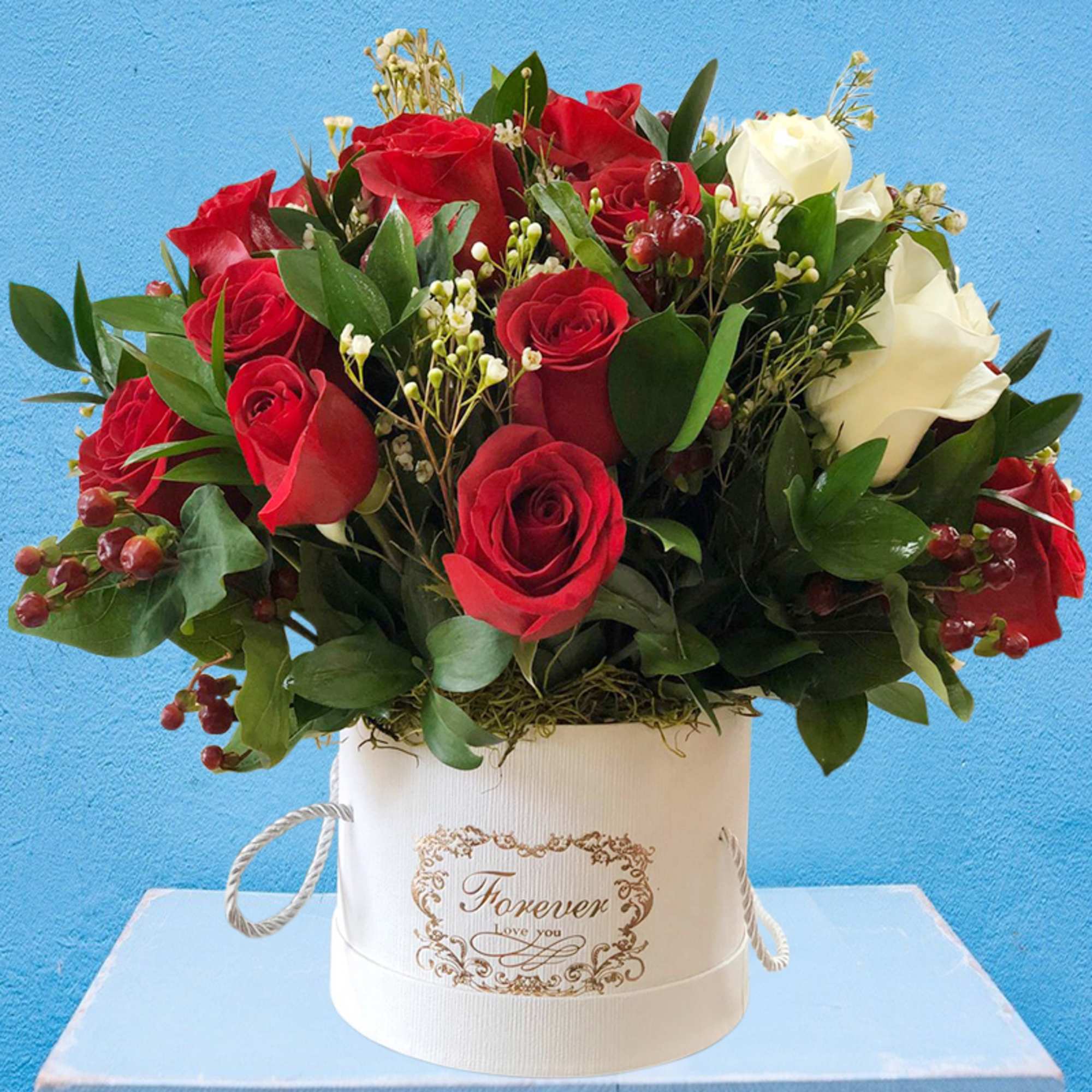 Red and white roses arranged in a white hat box, photo 2 of 2