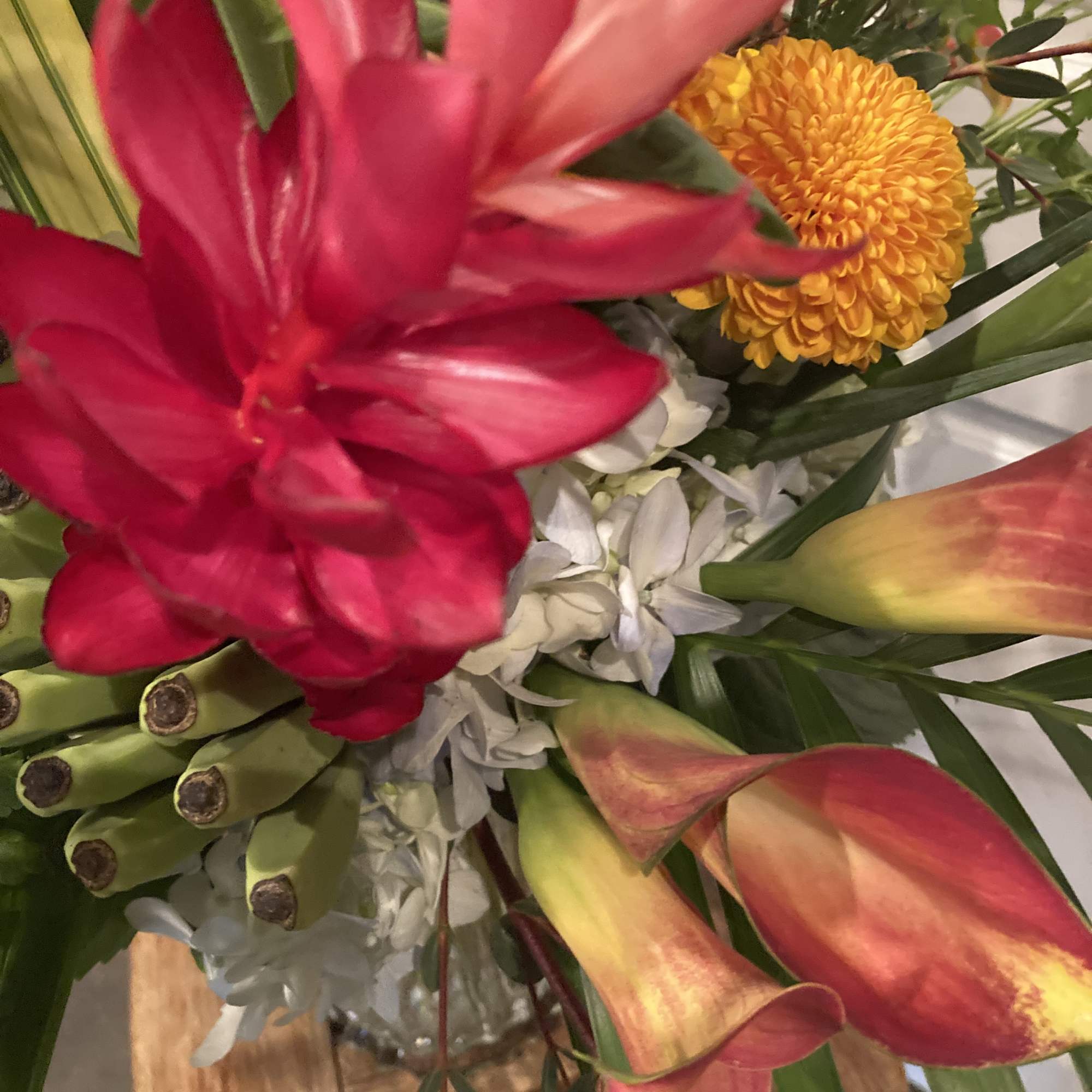 Bouquet with red dahlias, yellow chrysanthemum, and orange calla lilies