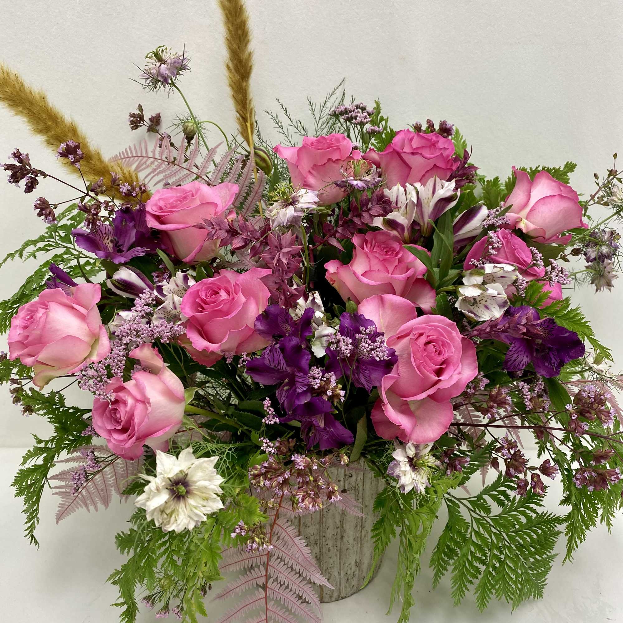 Soft, sweet  and sophisticated floral arrangement.