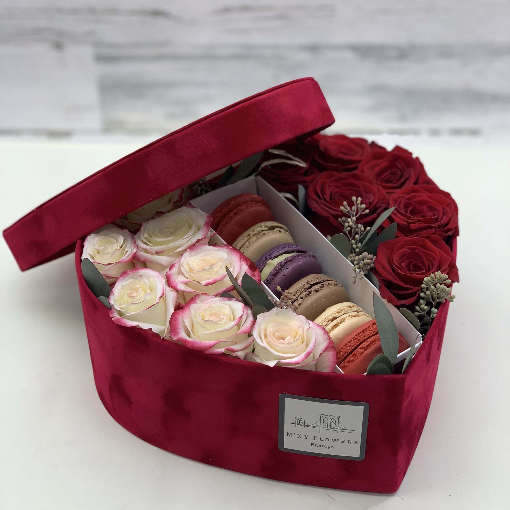 Red rose and macaron gift box in a velvet heart-shaped container