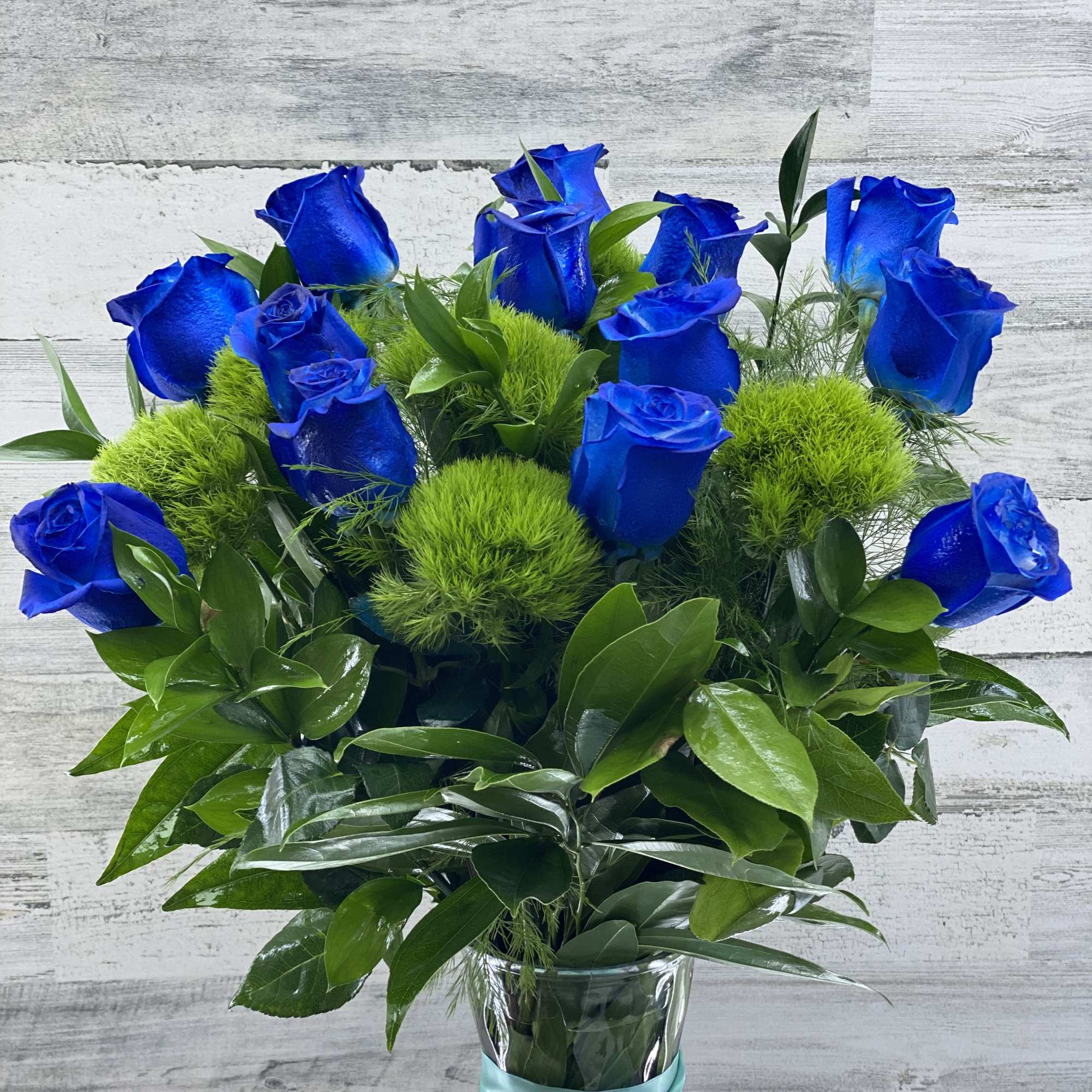 Fresh blue dozen roses with green., photo 2 of 2