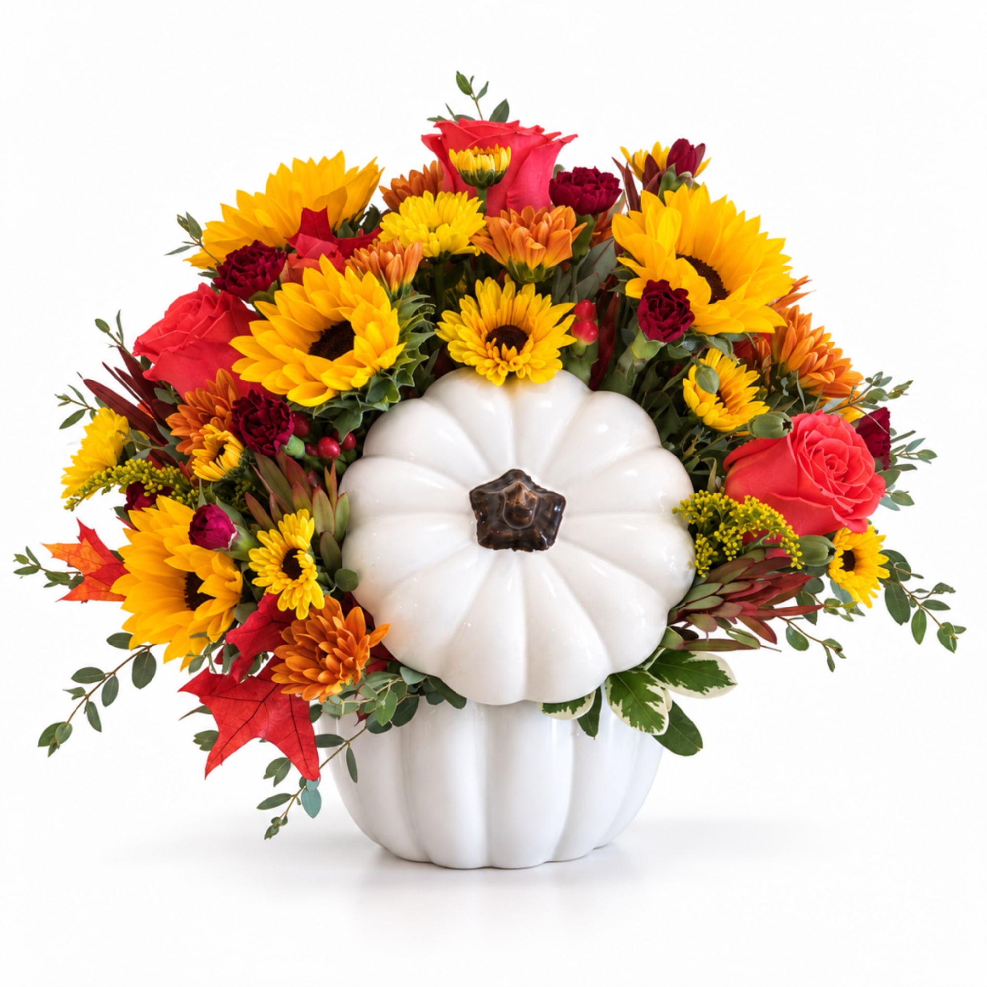 Fall floral arrangement in a white pumpkin container with sunflowers and roses