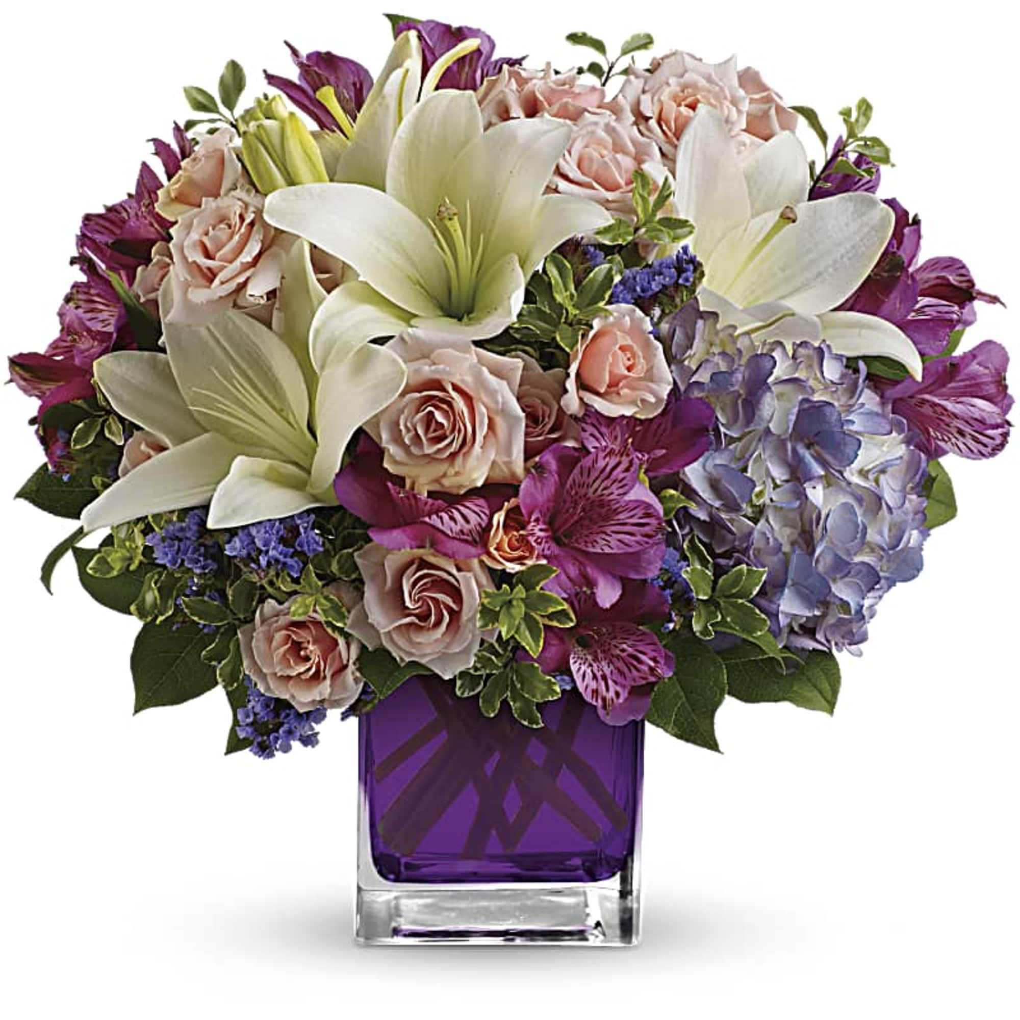 Bouquet of white lilies, pink roses, purple flowers in a purple vase