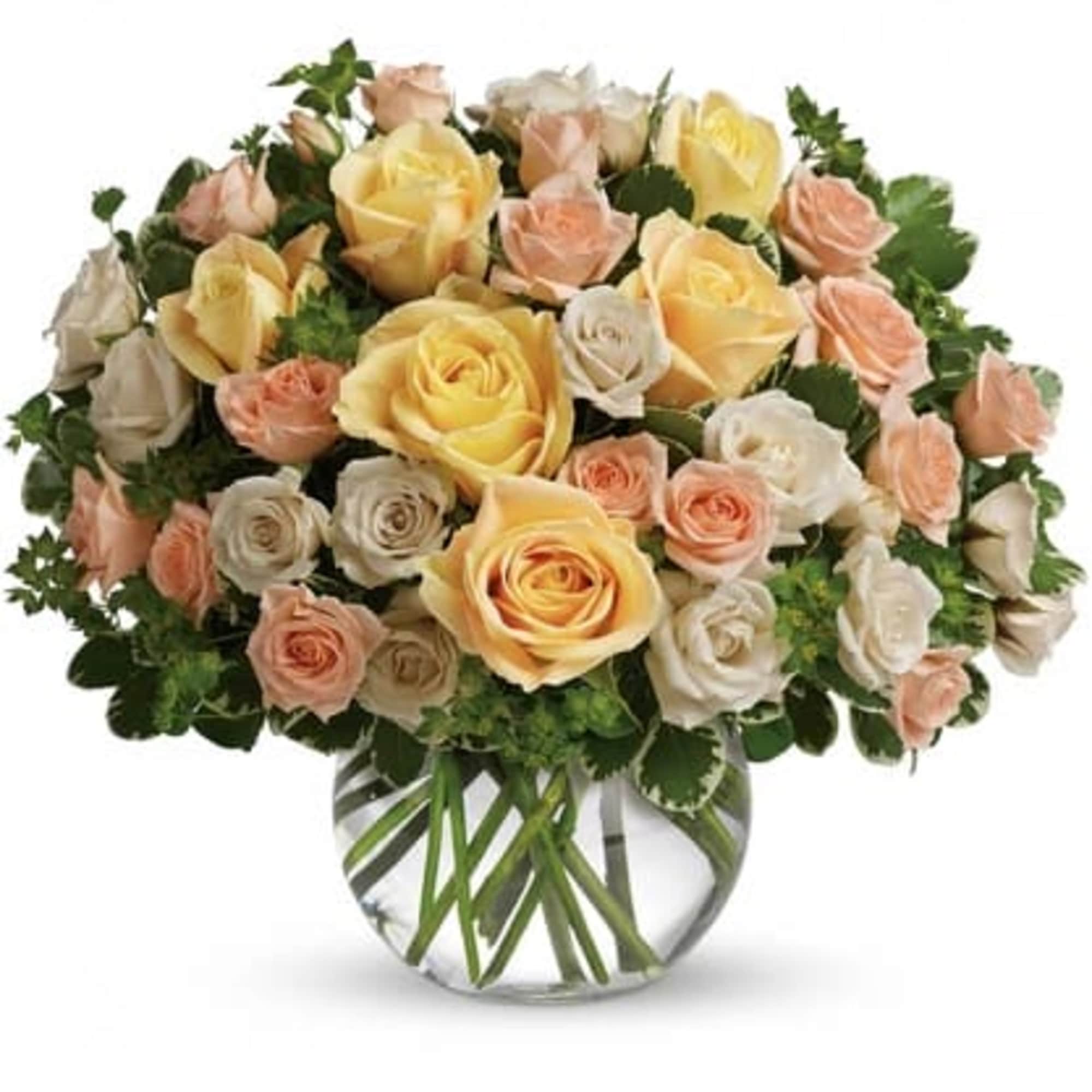 Bouquet of pastel roses in a clear glass vase