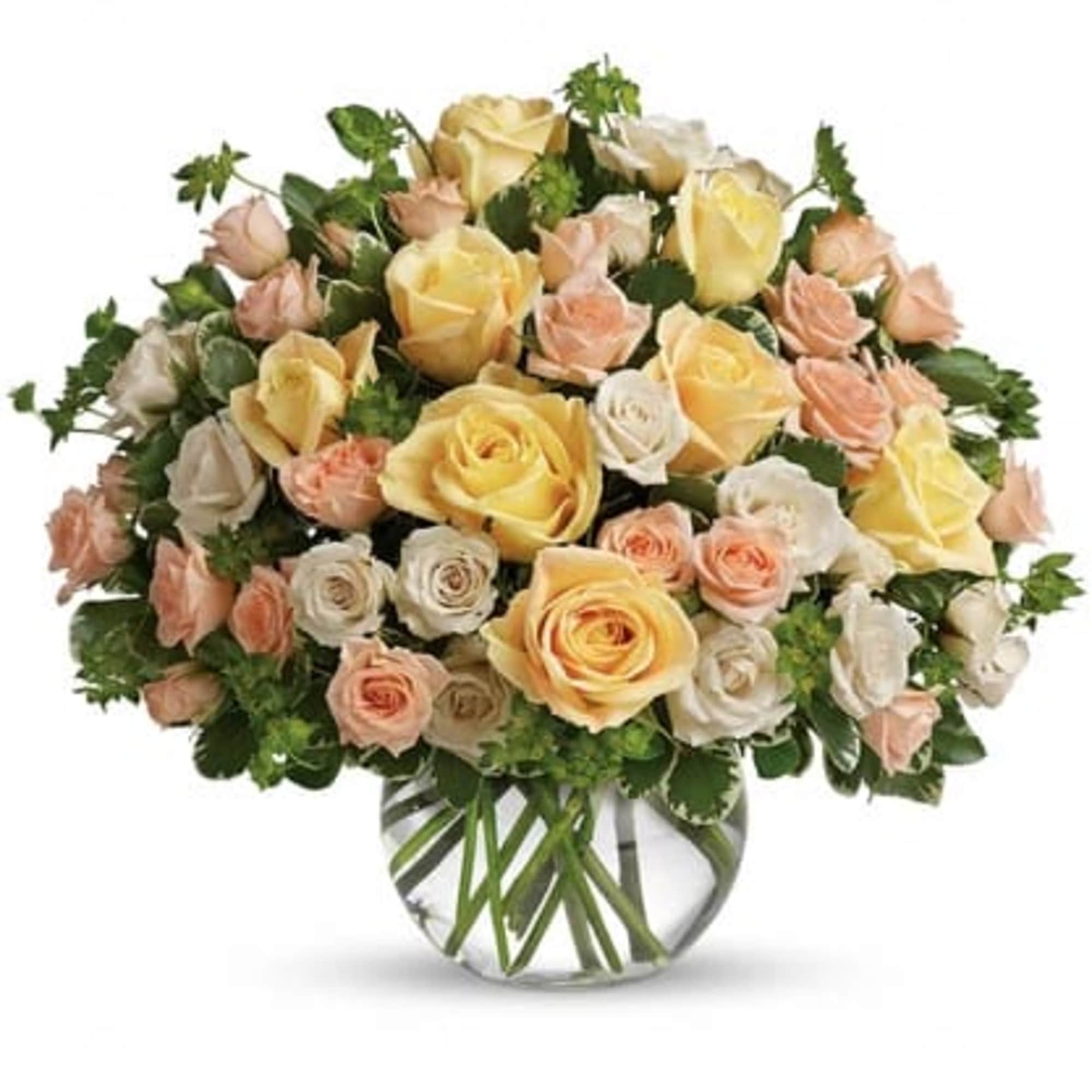 Bouquet of pale yellow, peach, and white roses in a glass vase