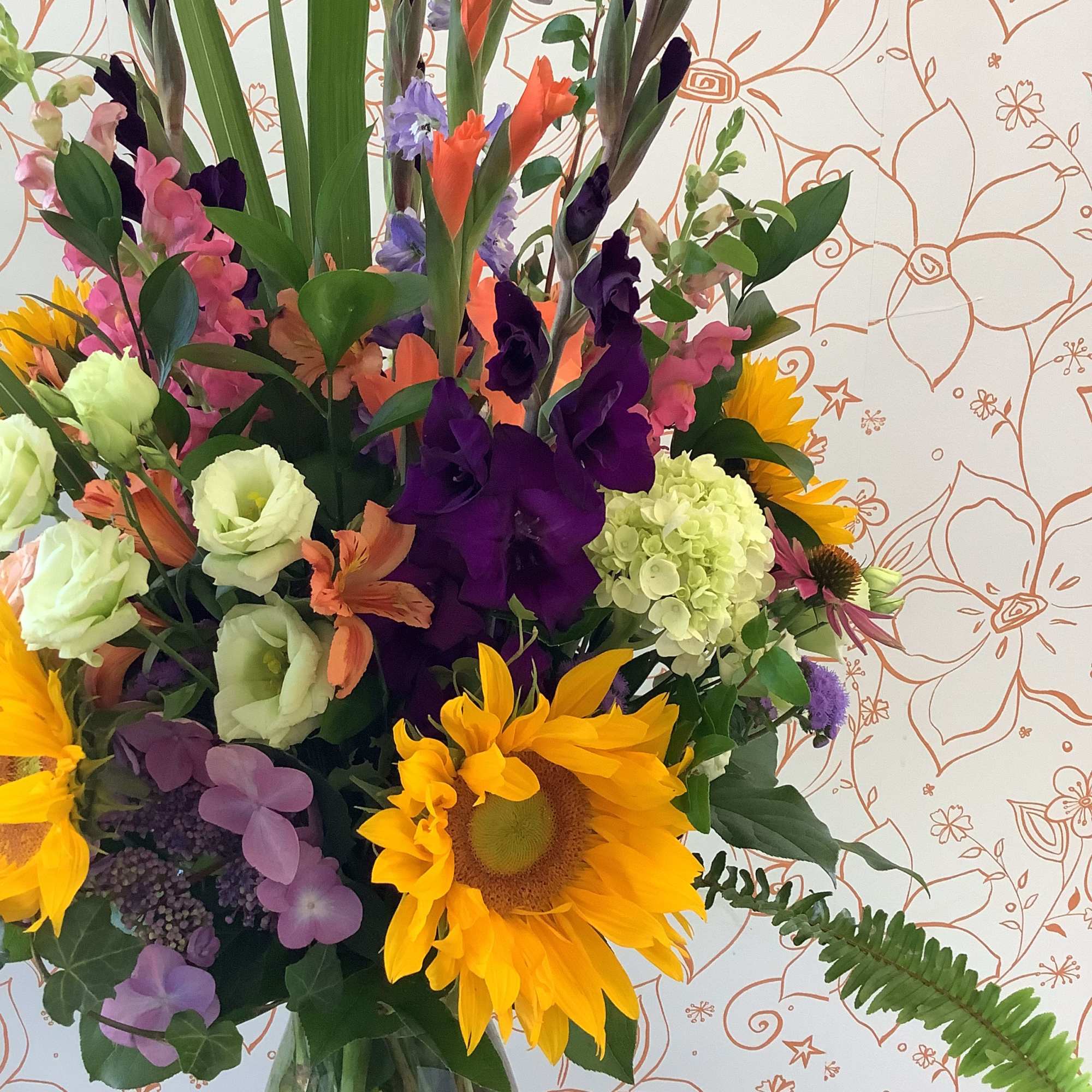 This gorgeous presentation features the brightest and blooms of the current season., photo 2 of 2