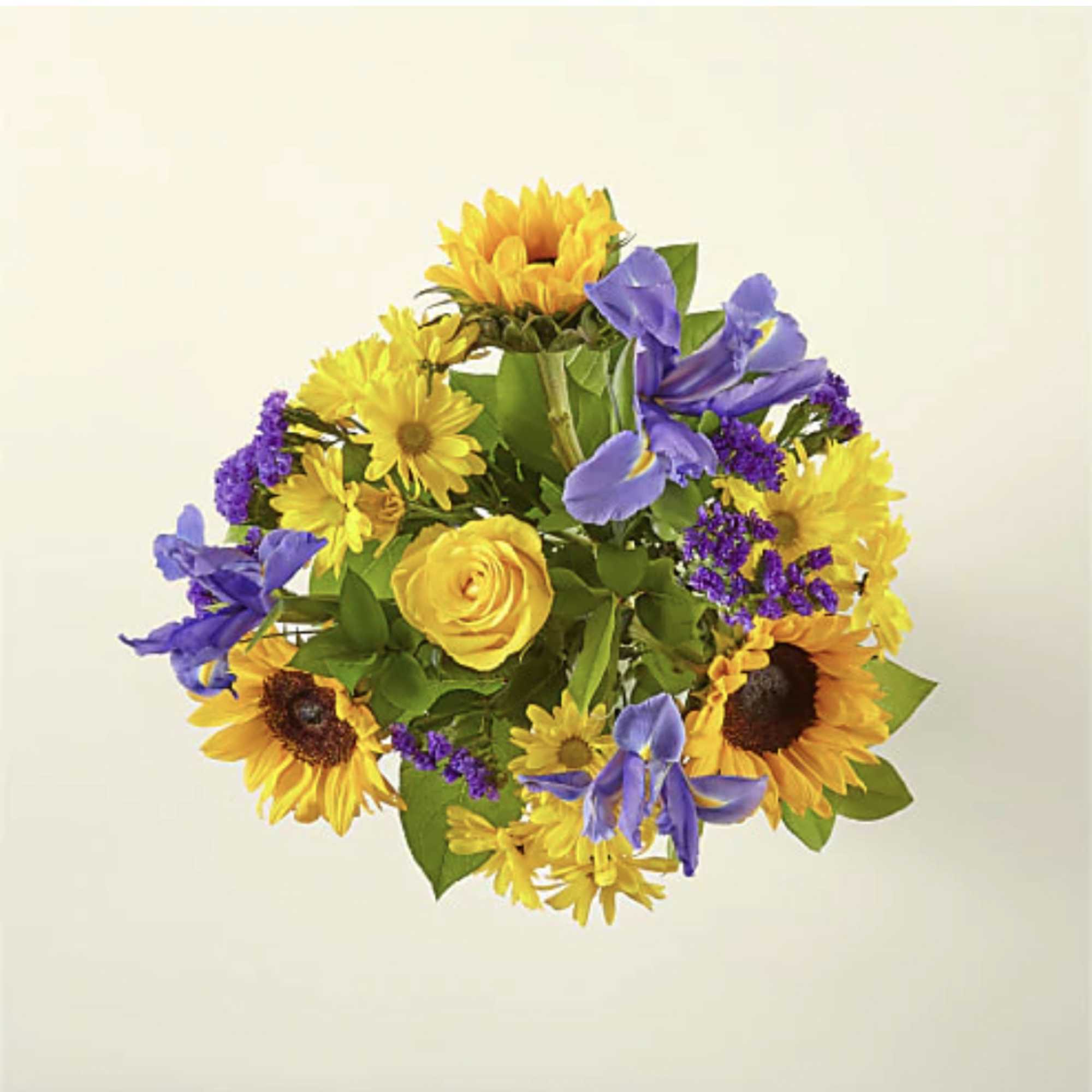 Bouquet of yellow sunflowers, roses, and purple irises