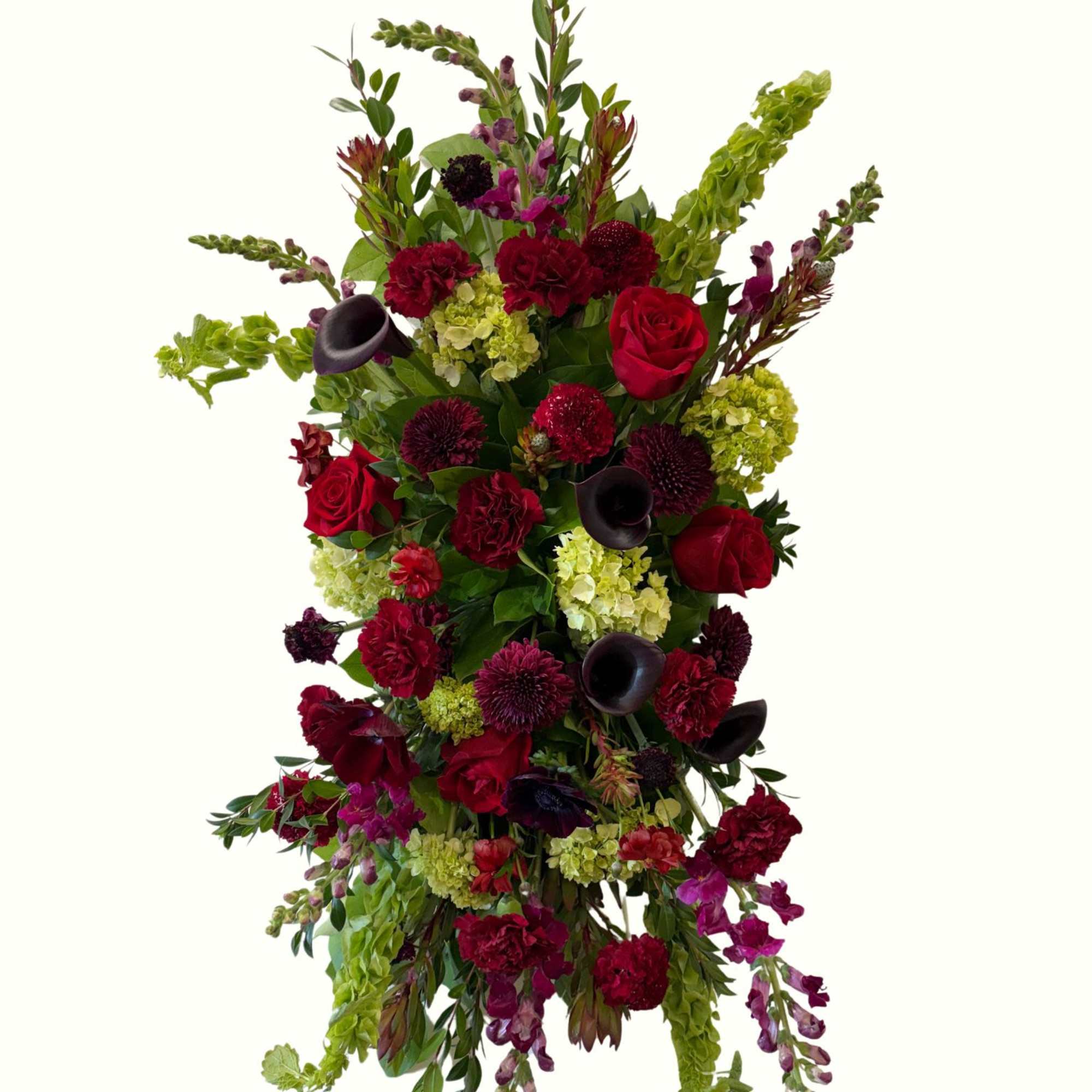 "Deepest Devotion" is a stunning and elegant funeral floral spray designed with