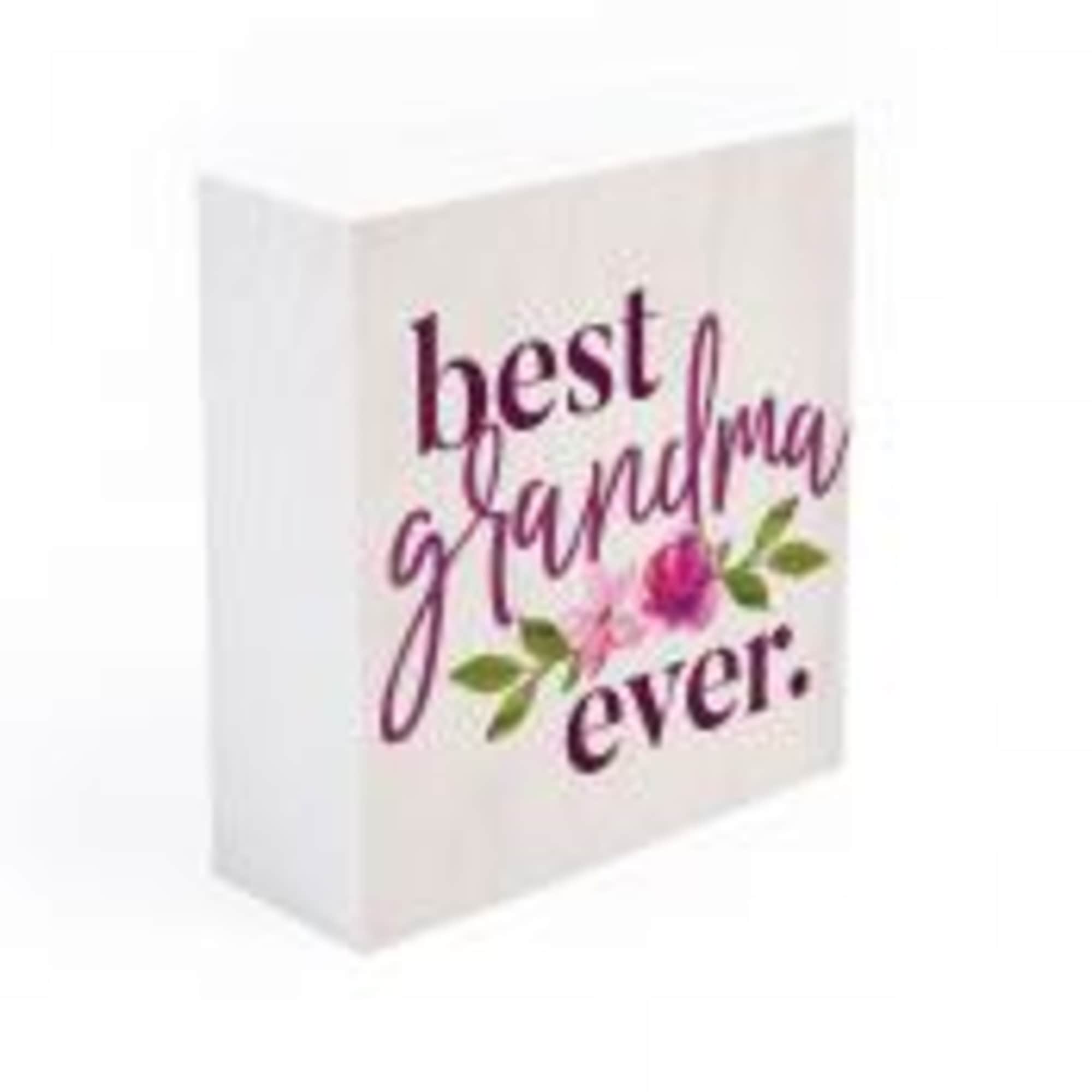 White gift bag with "best grandma ever" text and floral accents