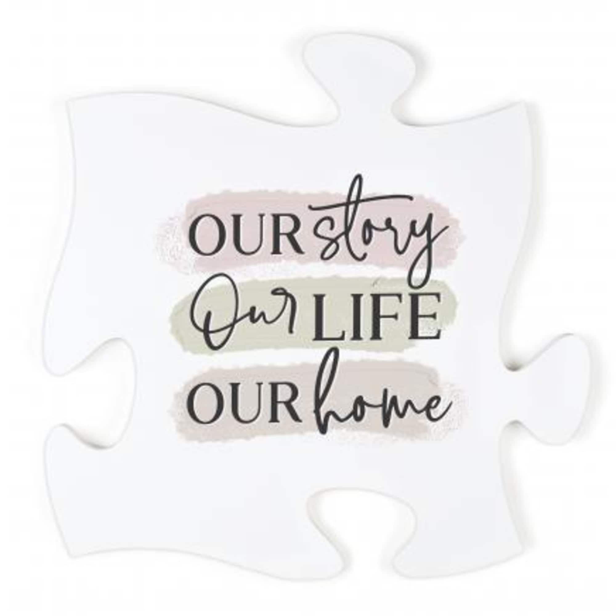 White puzzle piece sign with the words "Our story Our life Our home"