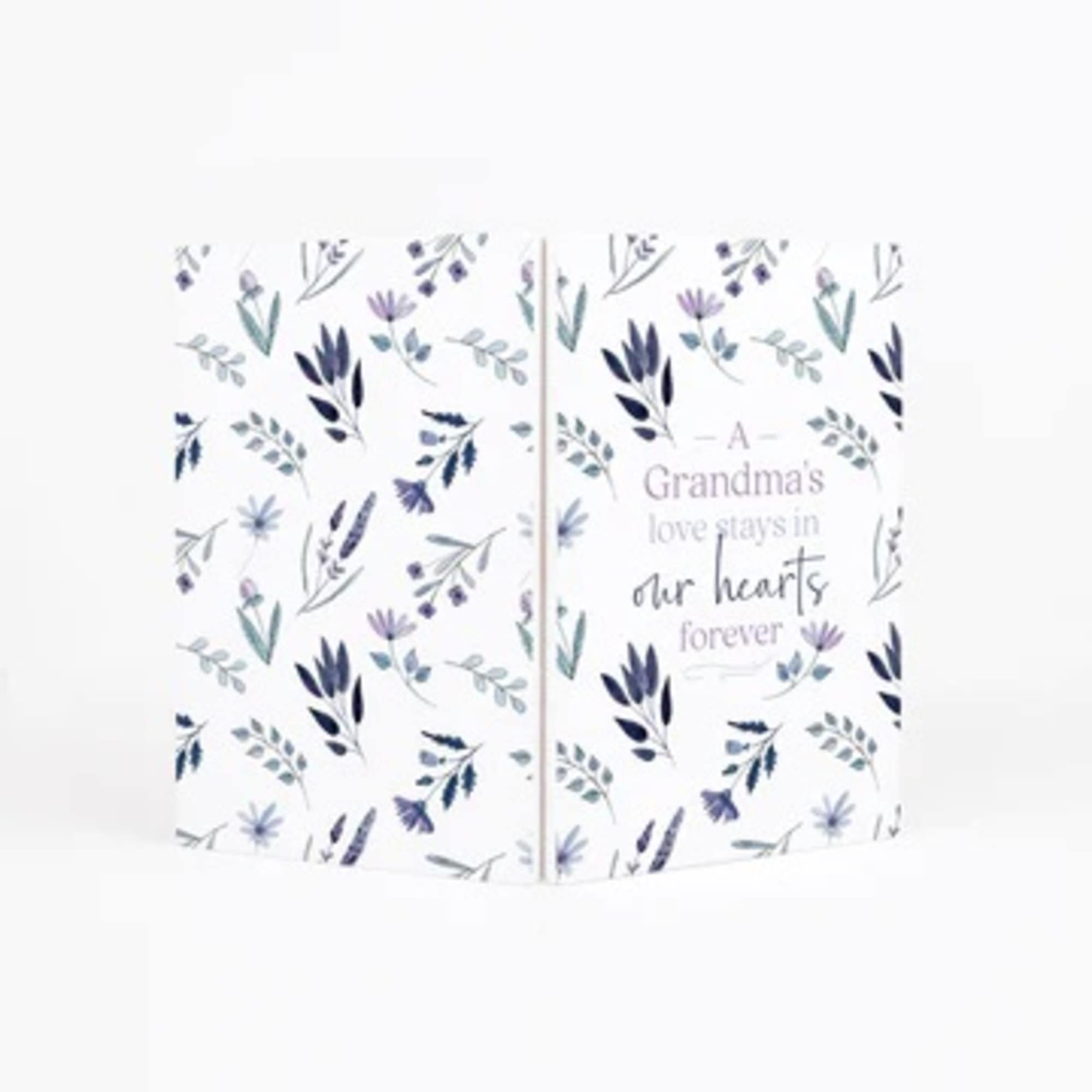 Floral-patterned gift bag with the words "A Grandma's love stays in our hearts forever"