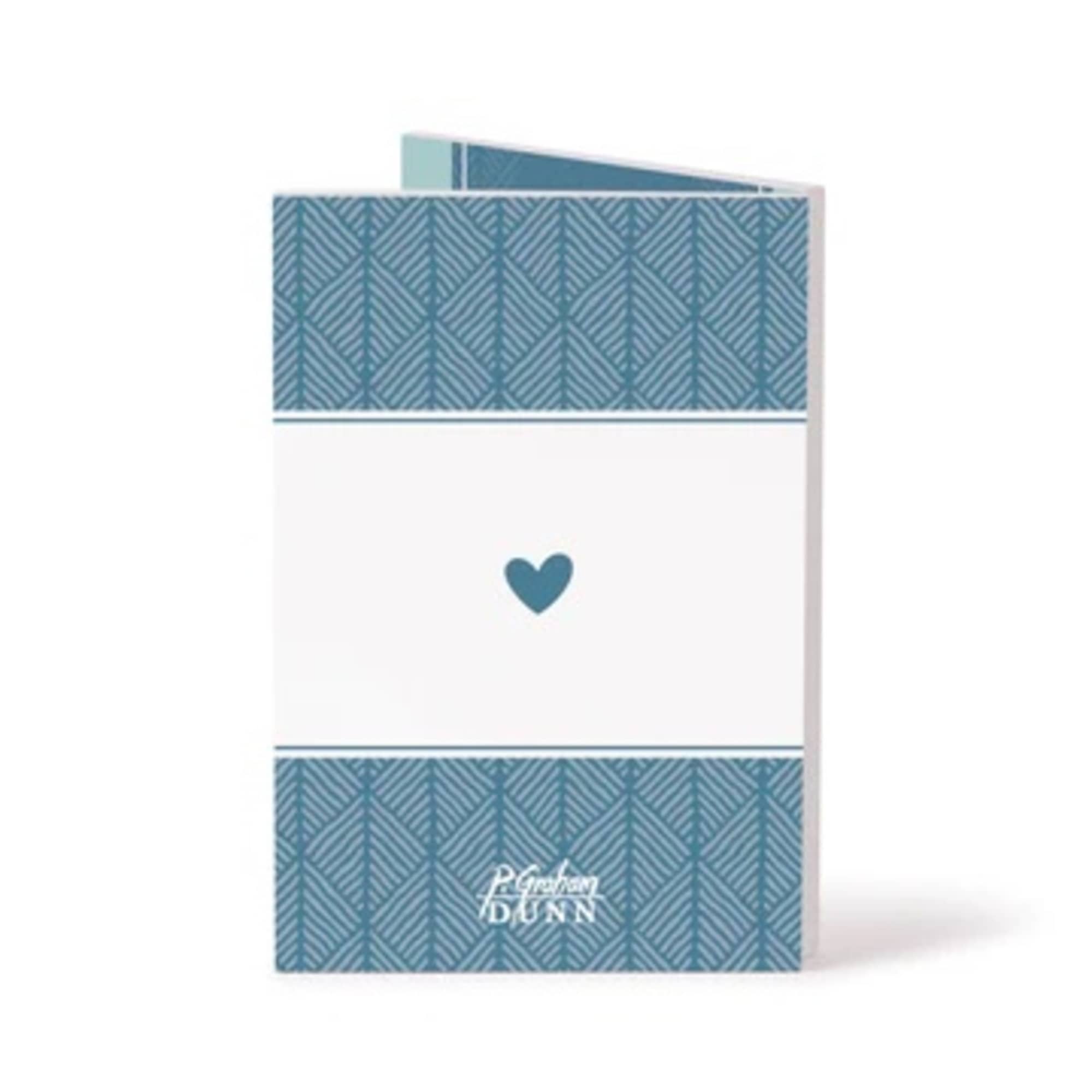 Blue patterned greeting card with a small heart on the front
