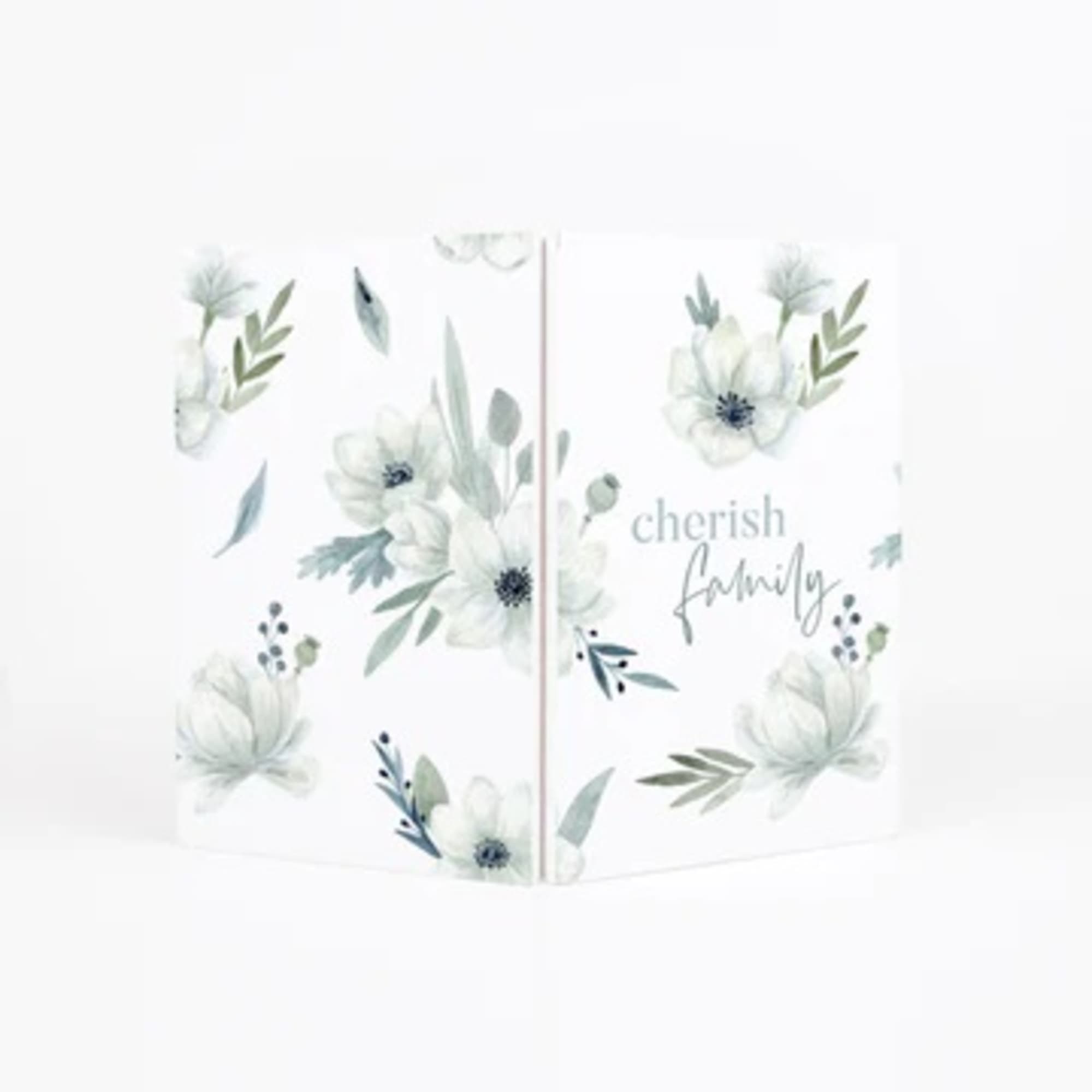 Floral gift bag with white flowers and the words cherish family