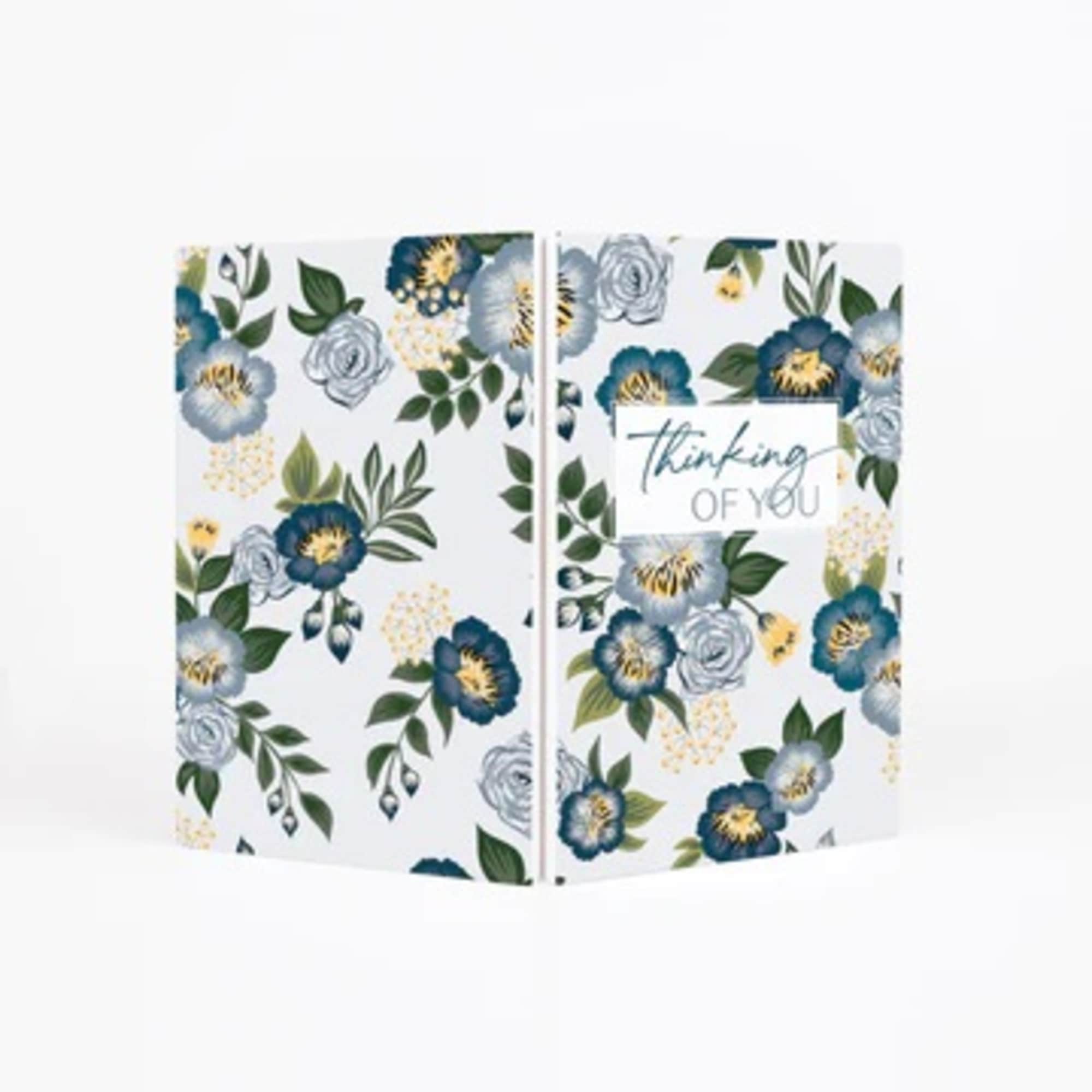 Floral-patterned gift bag with a "Thinking of You" tag