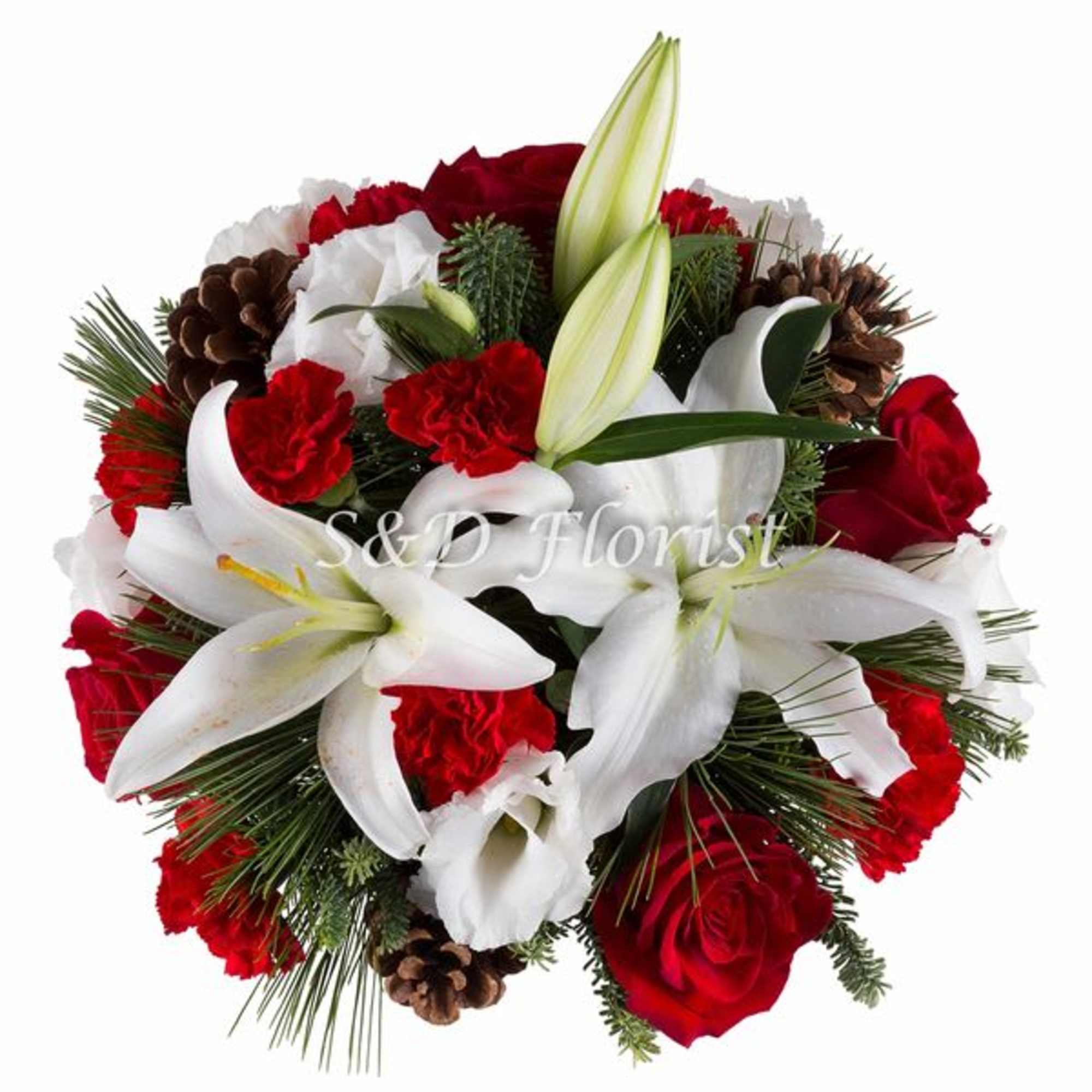Red roses and white lilies arranged with pinecones and evergreen sprigs