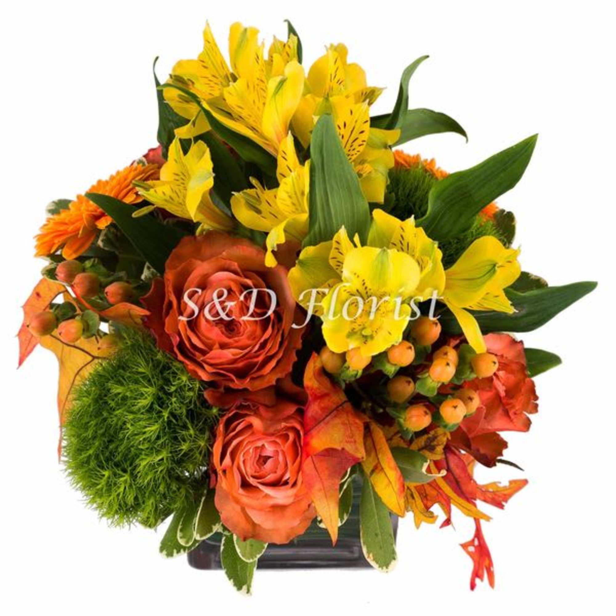 Orange roses and yellow alstroemeria in a black vase