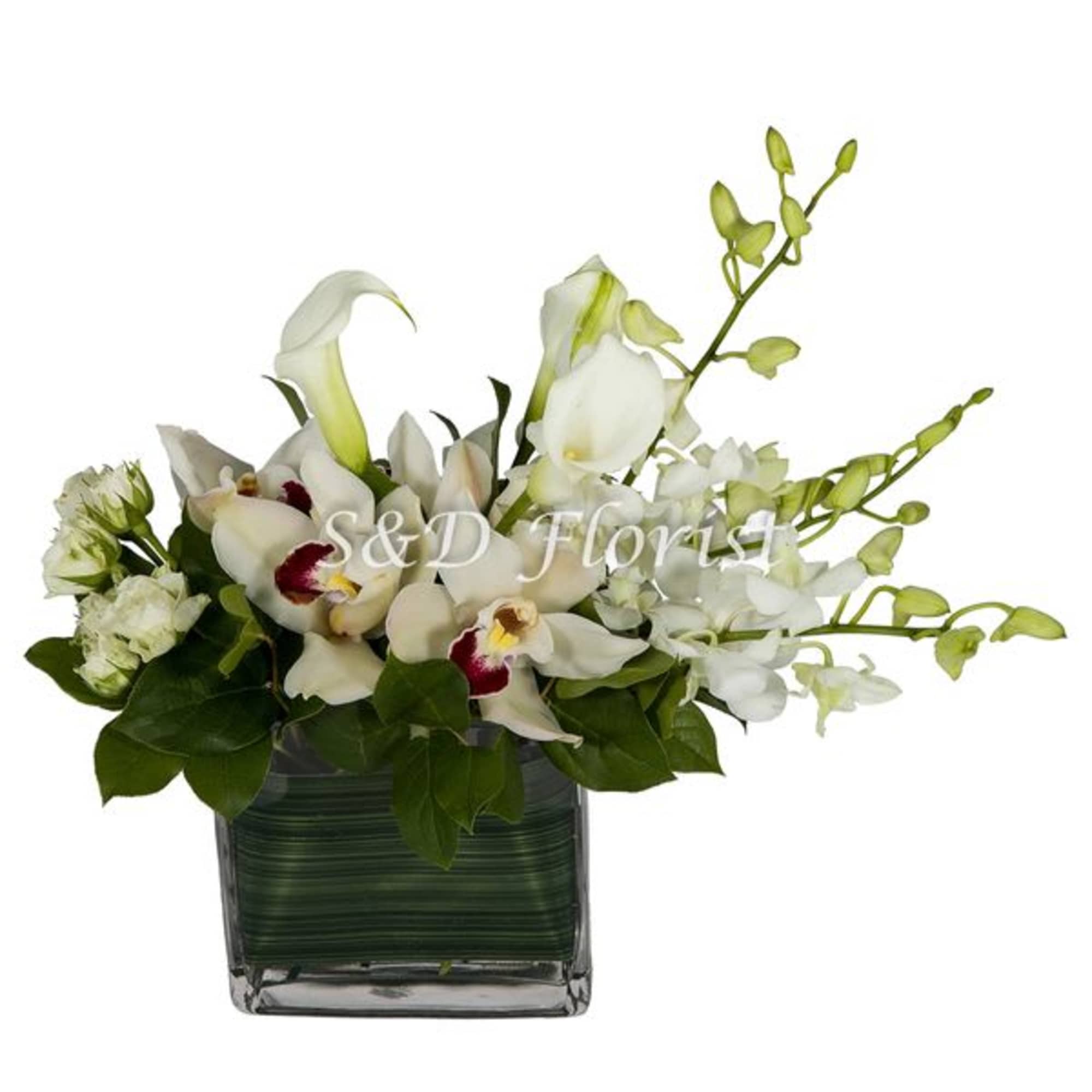 White orchids and calla lilies in a square glass vase