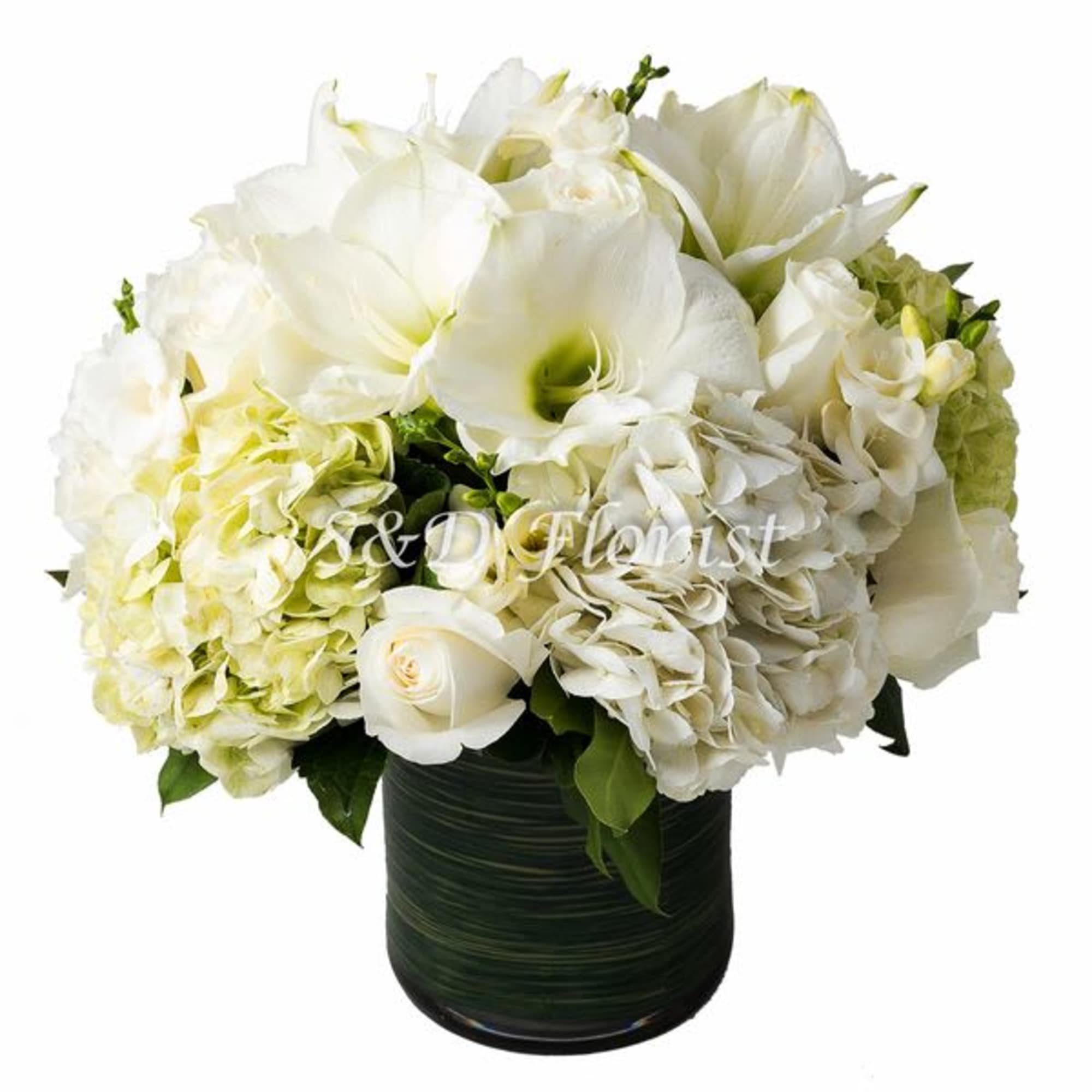 White flowers arranged in a dark green vase