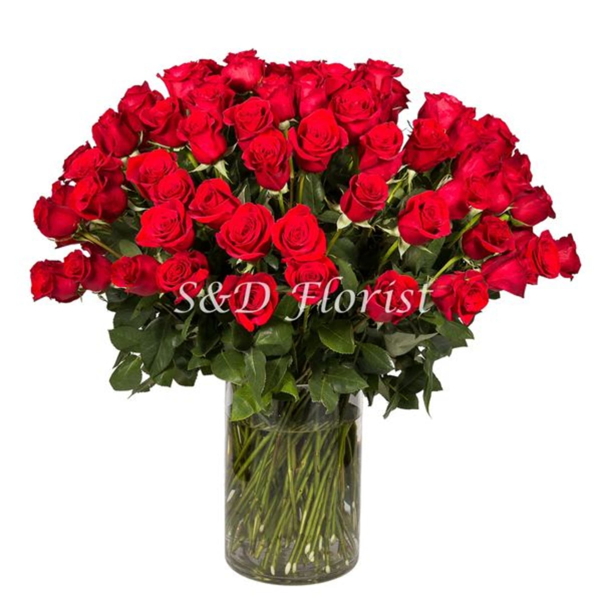 Bouquet of red roses in a clear glass vase